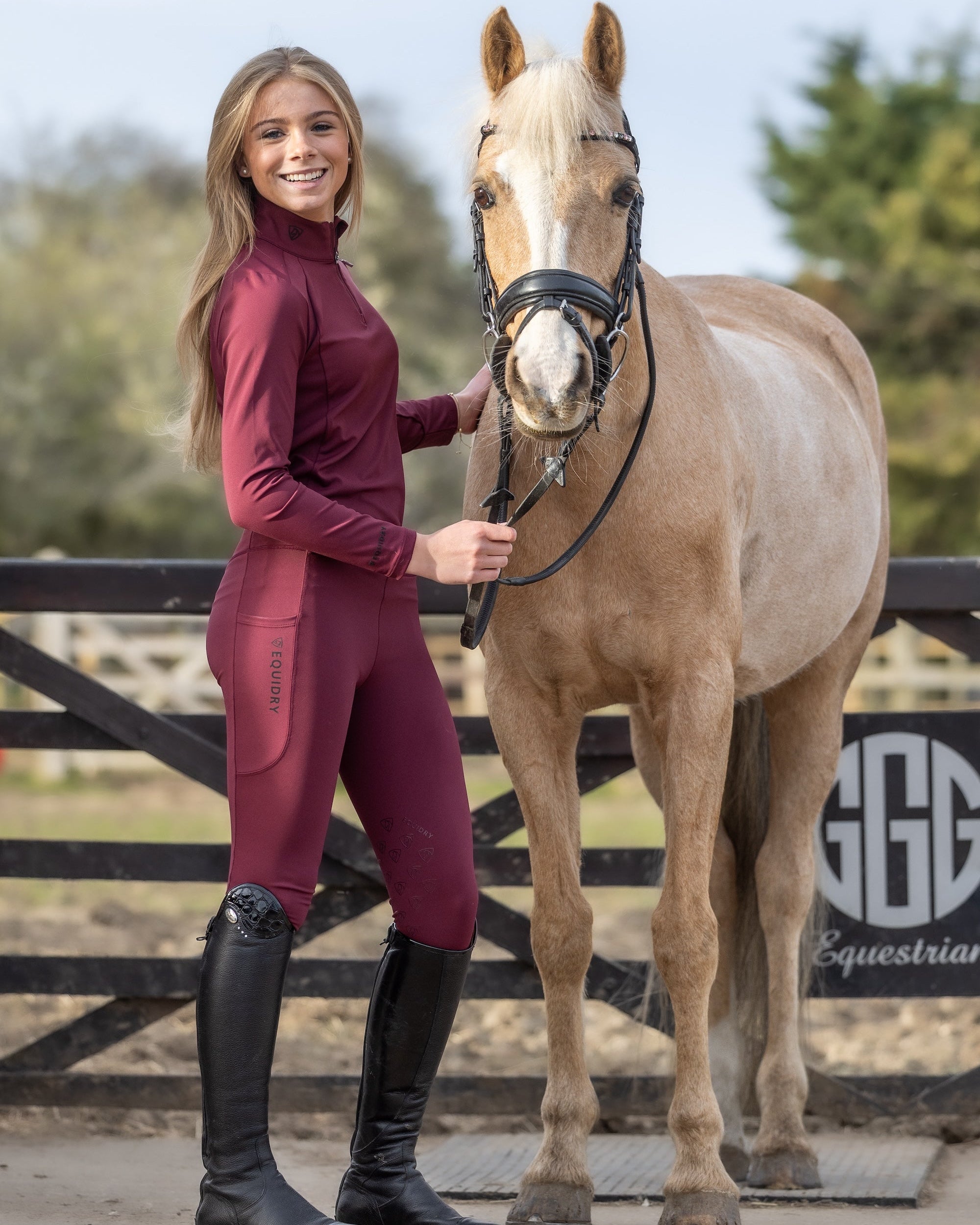 Child Equestrian & Palomino Horse in Equidry Base Layer. Plum & Black Riding Outfit by Equiflair. #Equidry #Equestrian