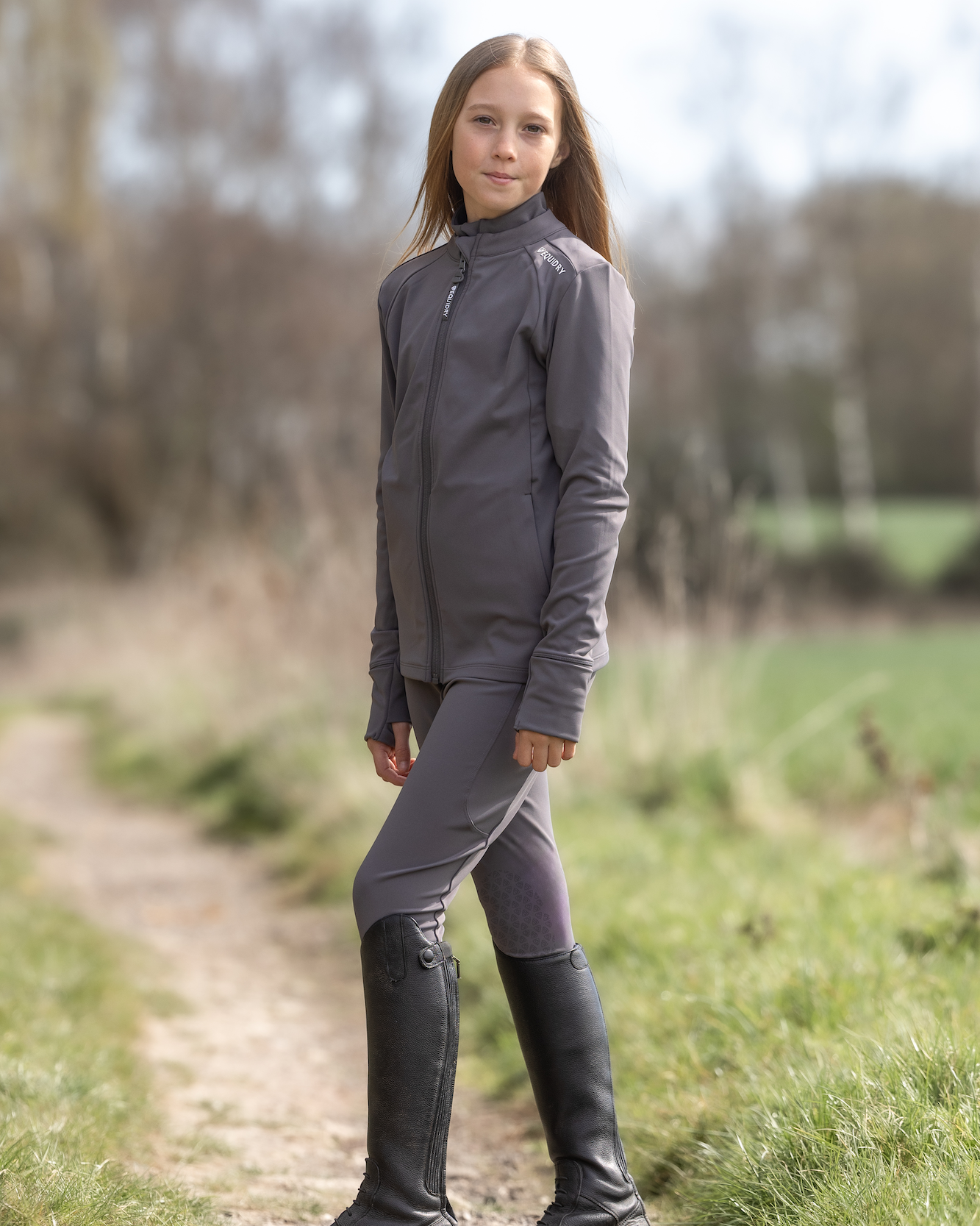 Equidry children's grey water repellent zip-up top from Equiflair, perfect for riding. Kids equestrian clothing.