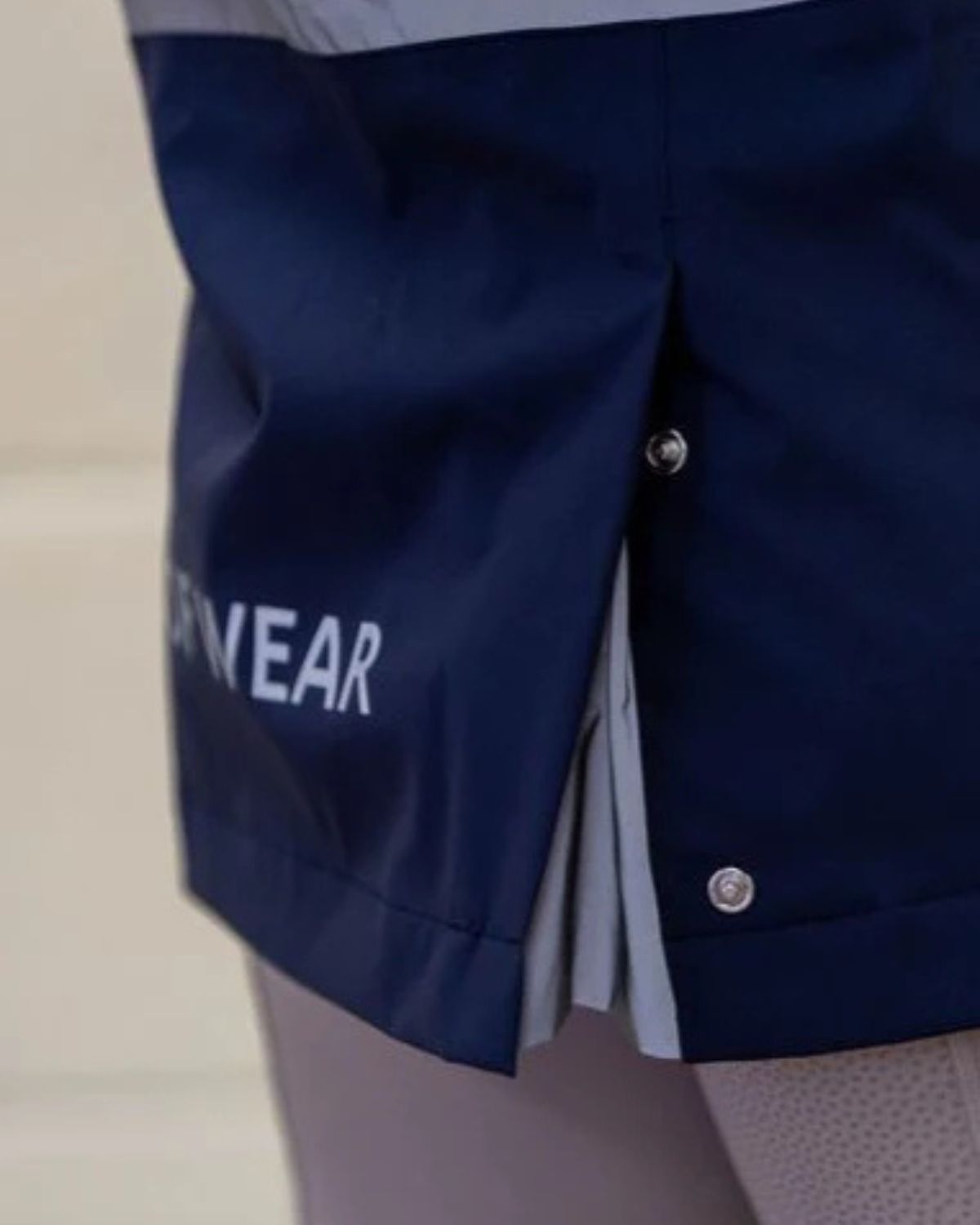 Woof Wear All Season Riding Jacket in Navy: Waterproof Equestrian Outerwear with Reflective Details and Button Closure