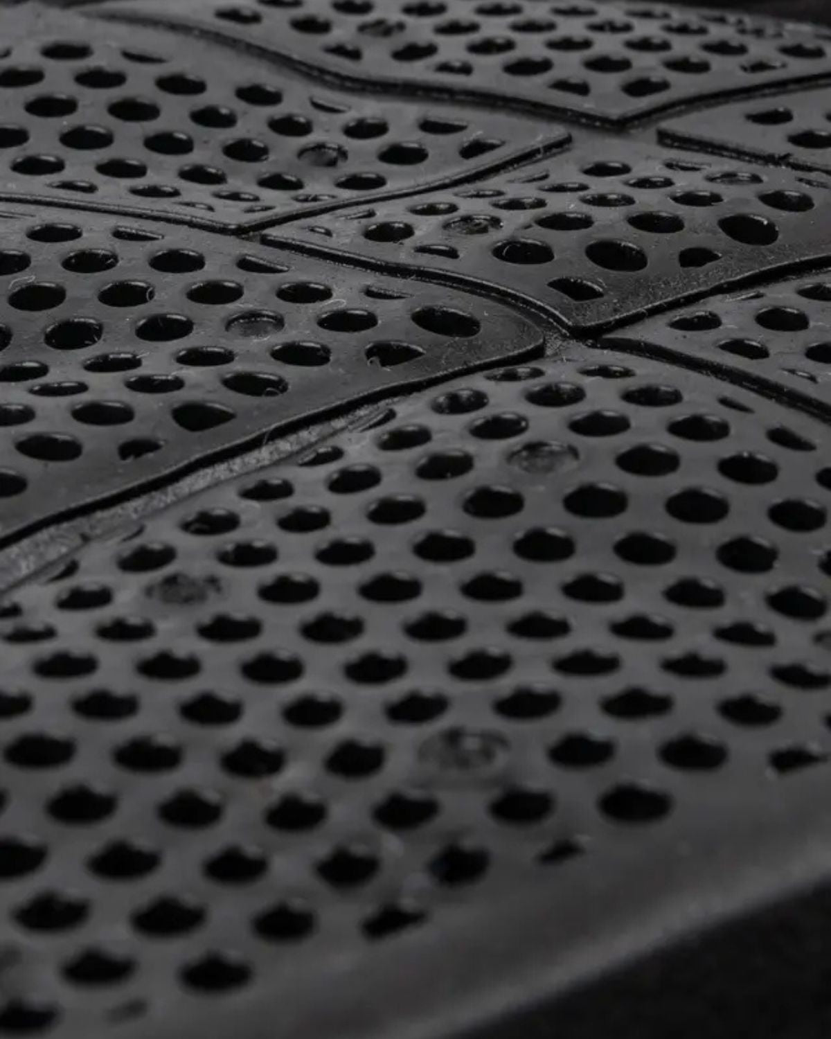 LeMieux X-Grip Twin Sided Half Pad Black: Close-up of silicone grip saddle pad.