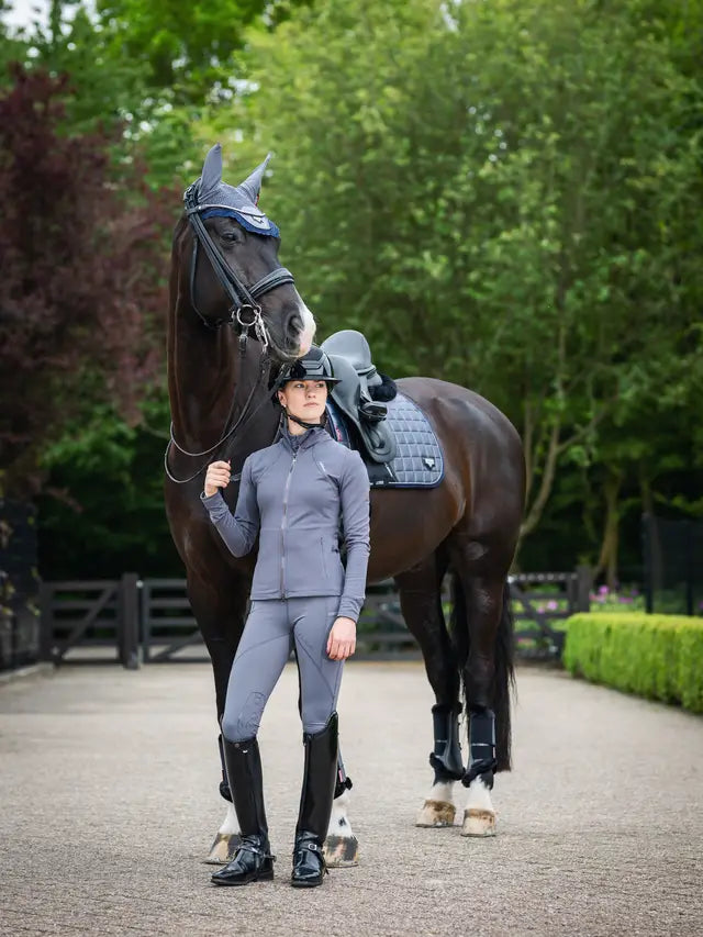 Equestrian Lifestyle: Woman in LeMieux Lucie Mesh Leggings Grey with Horse - Stylish Horse Riding Apparel