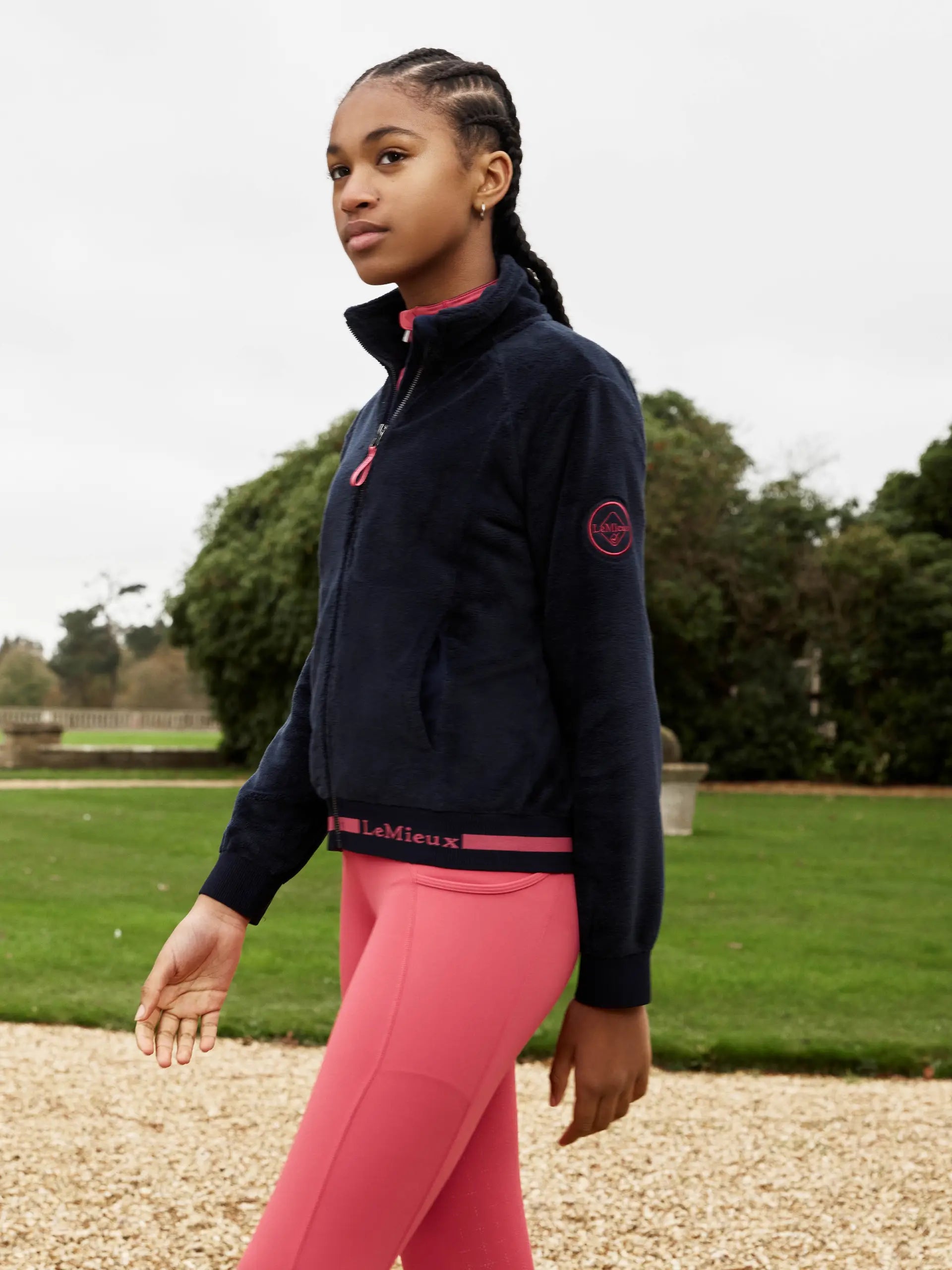 Young Rider Libby Fleece - Navy LeMieux Equestrian Jacket by Equiflair. Girl wearing comfortable & stylish fleece.