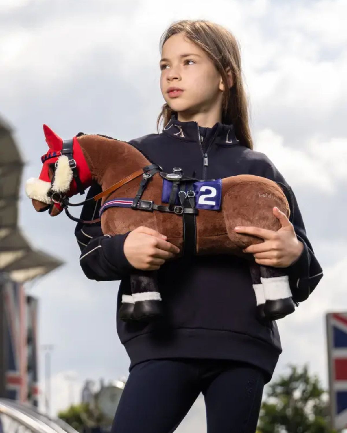 LeMieux Toy Pony Racing Saddle Set Black - Equiflair. Child with toy horse.