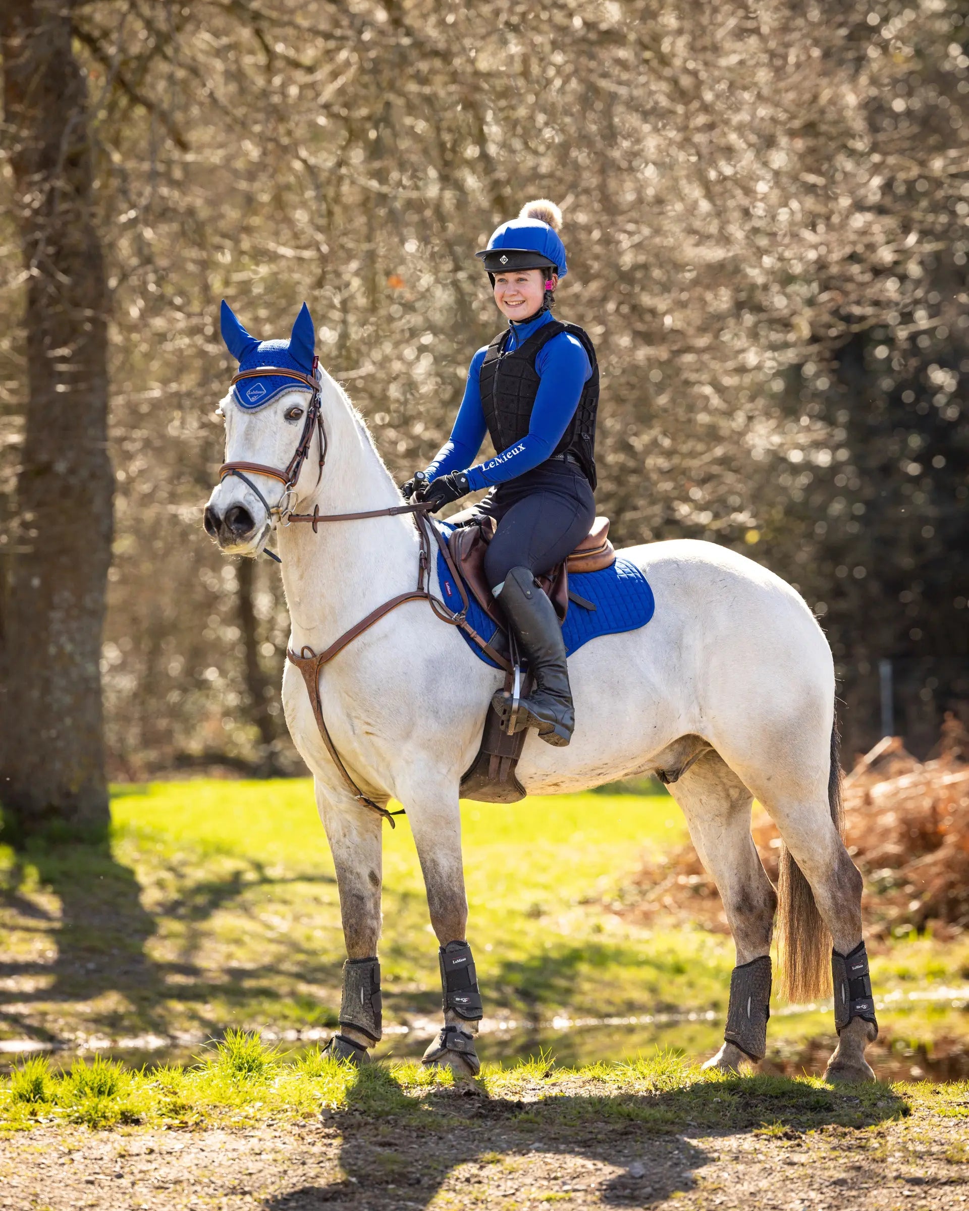 Lemieux Suede GP Square Saddle Pad in Benetton Blue on Horse | Equestrian Gear by Equiflair