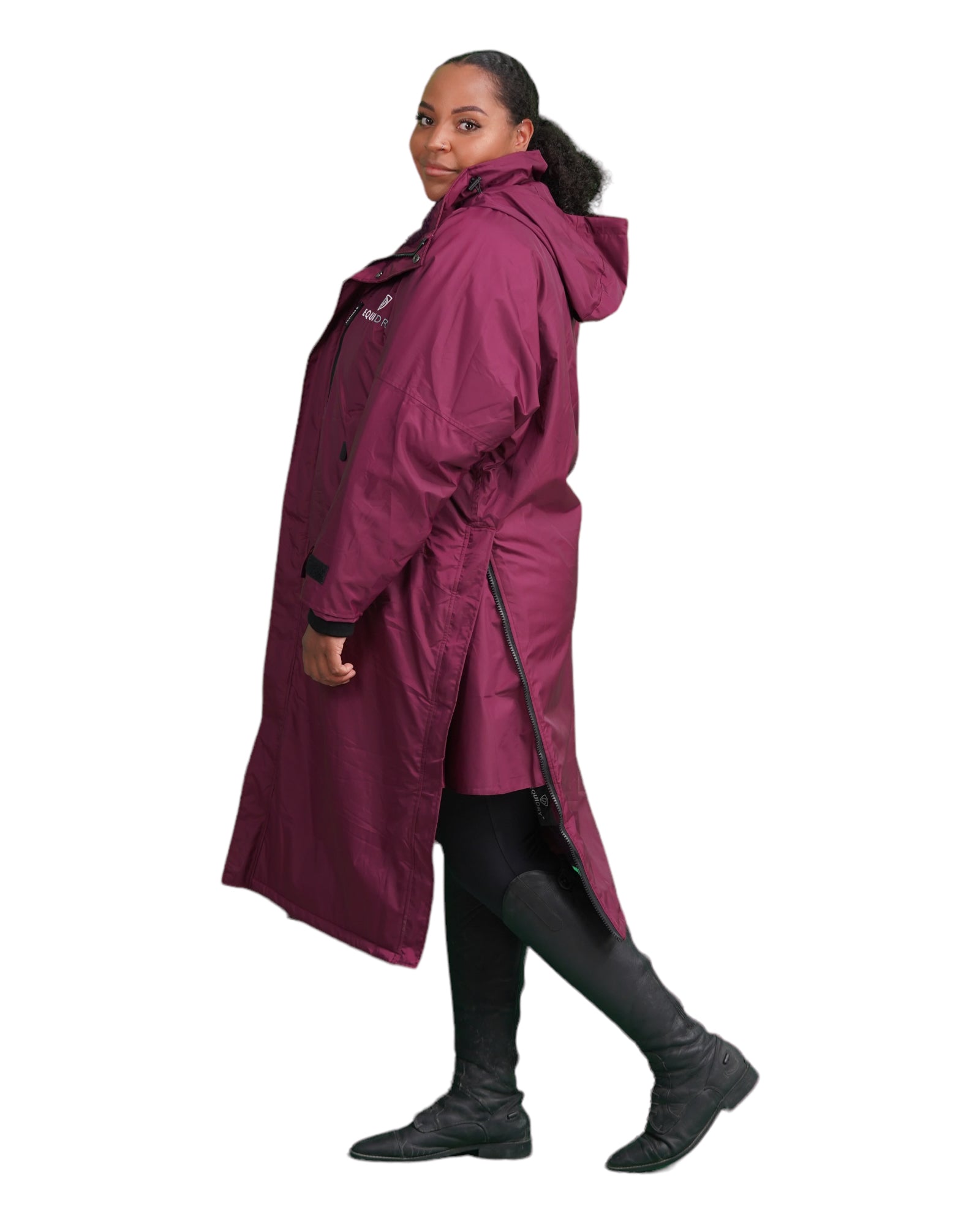 Evolution Pro women's Warm Waterproof Horse Riding Coat Thick Fleece Lining Stowaway Hood Plum image of side of coat with storm skirts and side zips