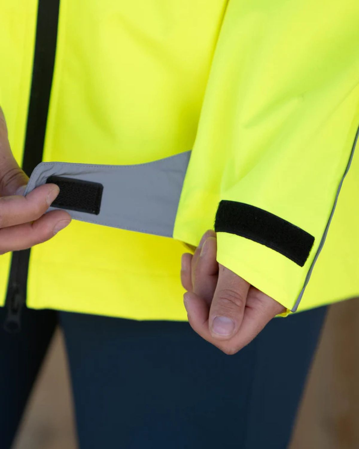 Hi Viz Riding Jacket in Yellow with Adjustable Velcro Sleeves for Enhanced Visibility.