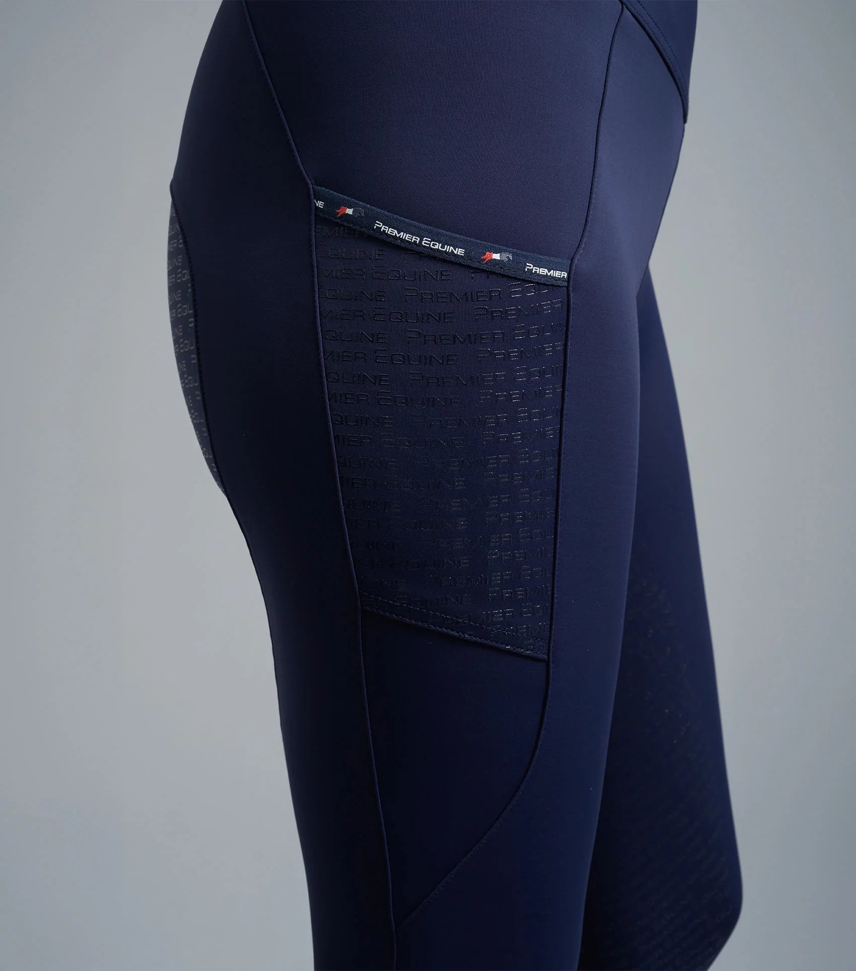Premier Equine Aporia Navy Riding Tights: Ladies Equestrian Apparel with Phone Pockets & Silicone Gel Seat