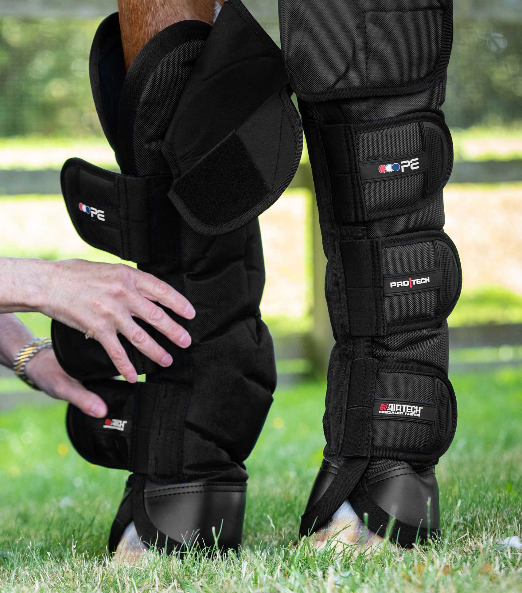 Premier Equine Ballistic Knee Pro-Tech Black Horse Travel Boots. Protective legwear for horses during transport.