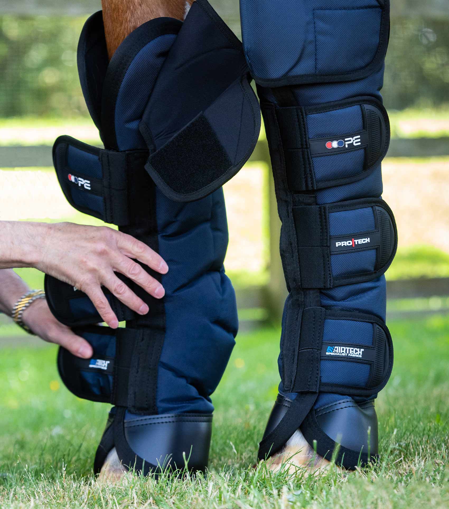 Premier Equine Ballistic Pro-Tech Navy Horse Travel Boots for Knee Protection being Fitted