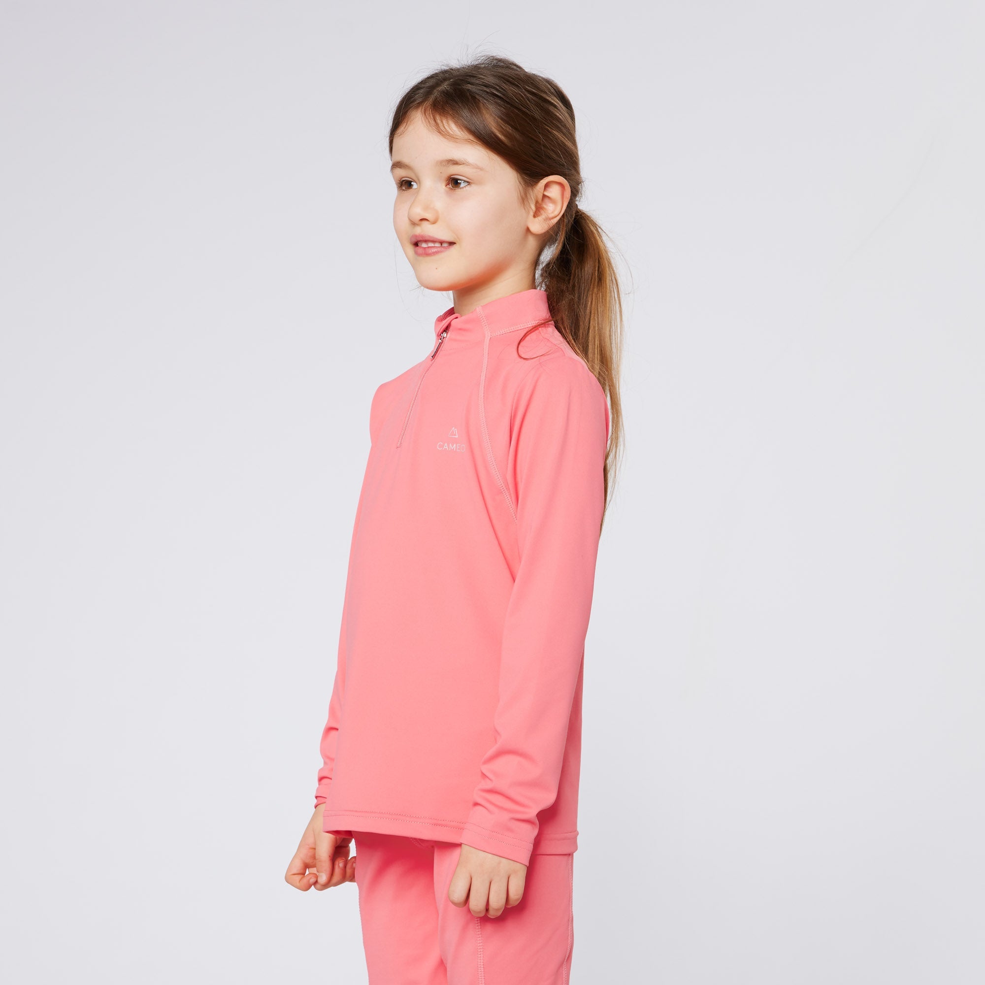 Girl in Pink CAMEO Equestrian Baselayer: Comfortable, Moisture-Wicking Riding Apparel