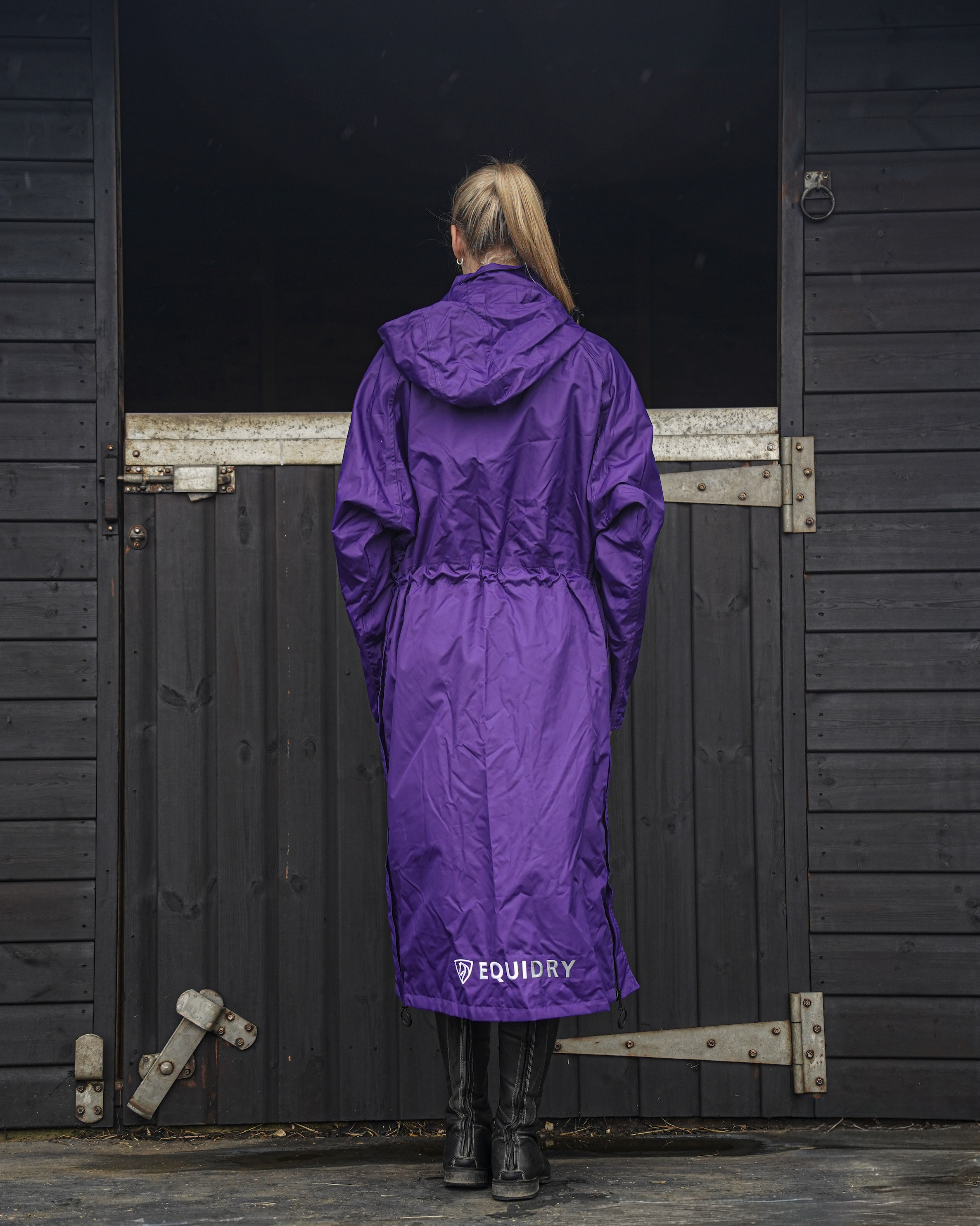 EQUIDRY Evolution Purple Coat: Women's Mesh-Lined Waterproof Horse Riding Jacket - Back View. Equiflair.
