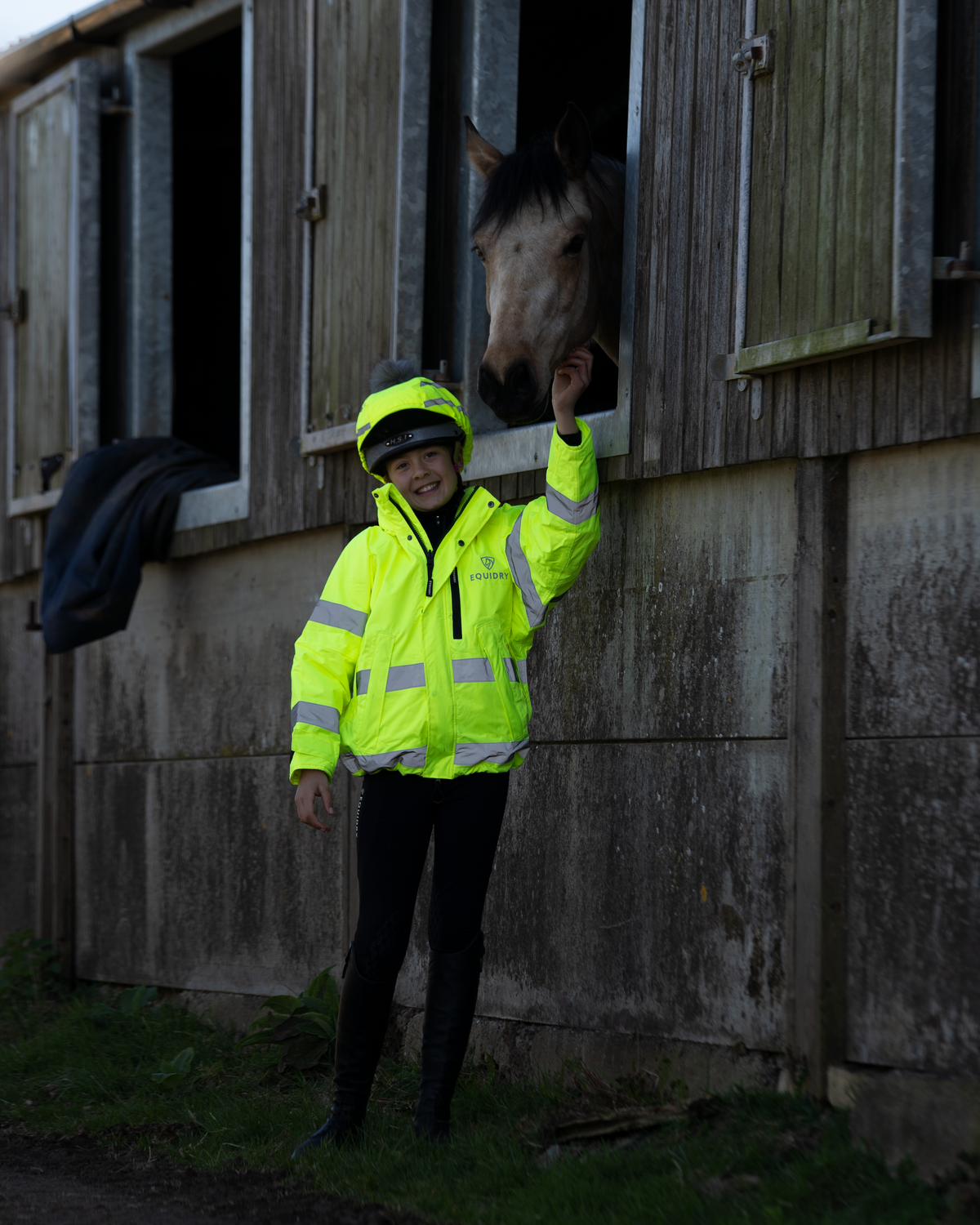 EQUIDRY children's hi-vis yellow riding jacket with horse in stable