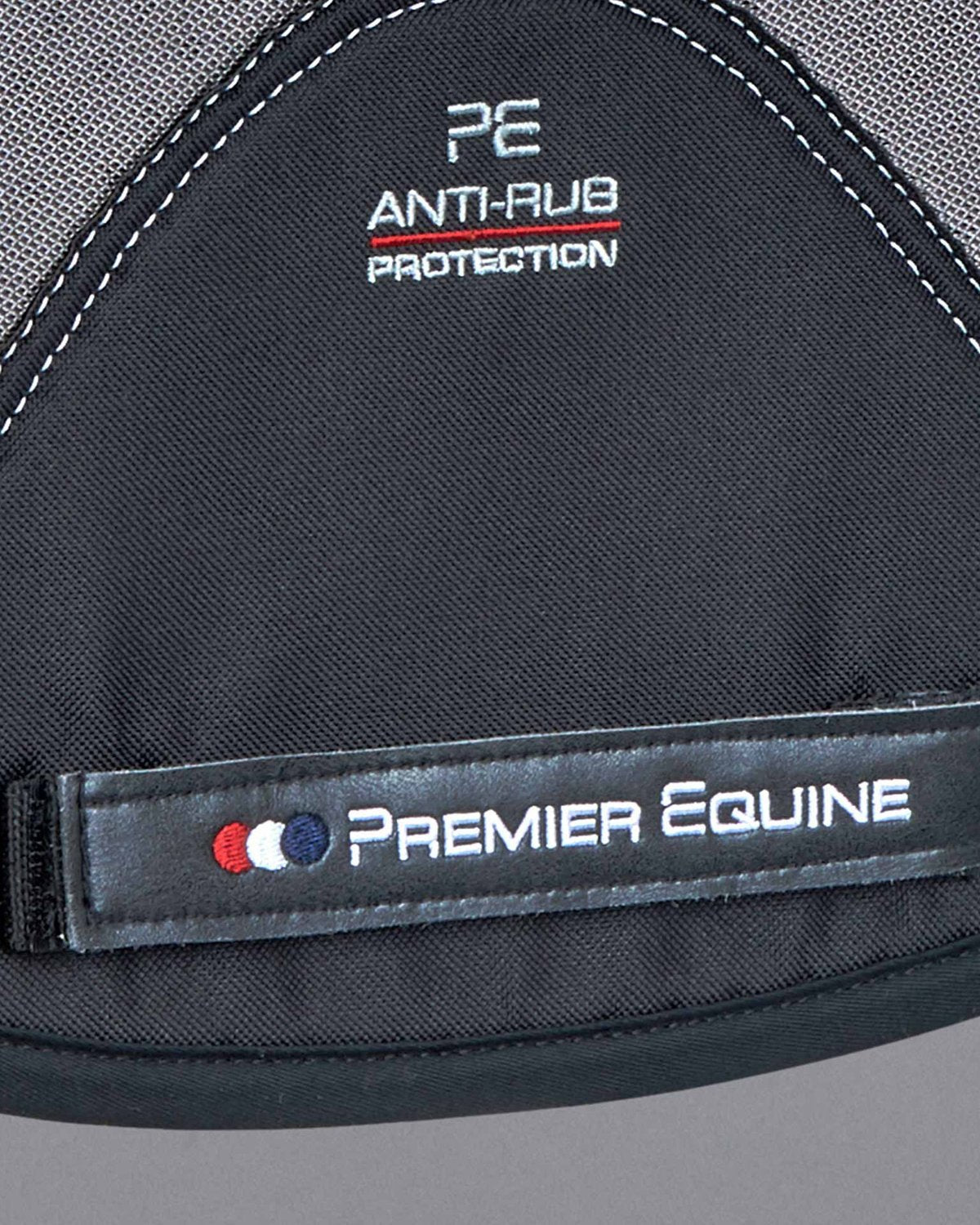PREMIER EQUINE Airtechnology Dressage Saddle Pad: Shockproof Wool, Anti-Rub Protection. Horse tack close-up.