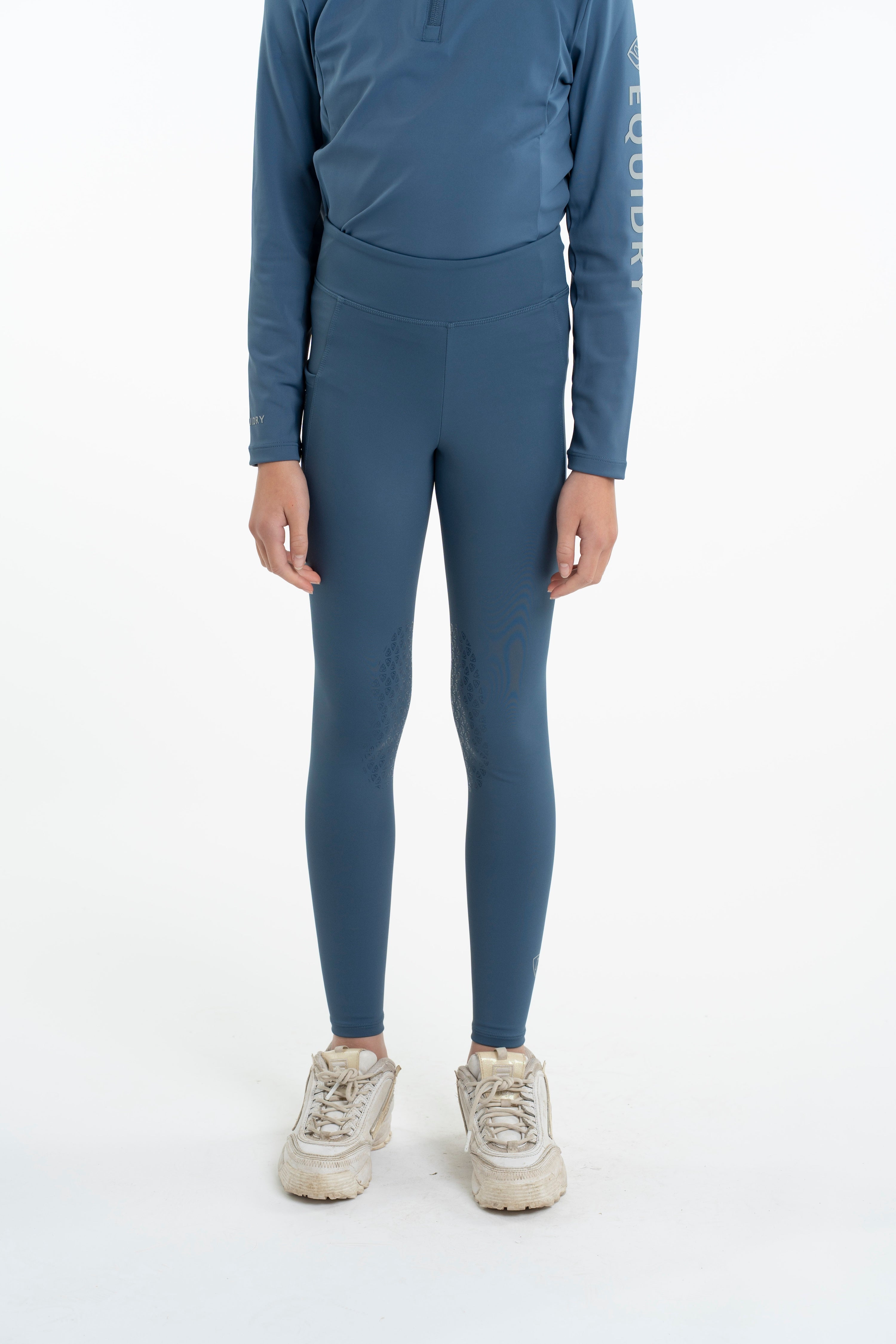 Child in EQUIDRY Steel Blue Riding Leggings: Water-Repellent Knee Grip Equestrian Apparel