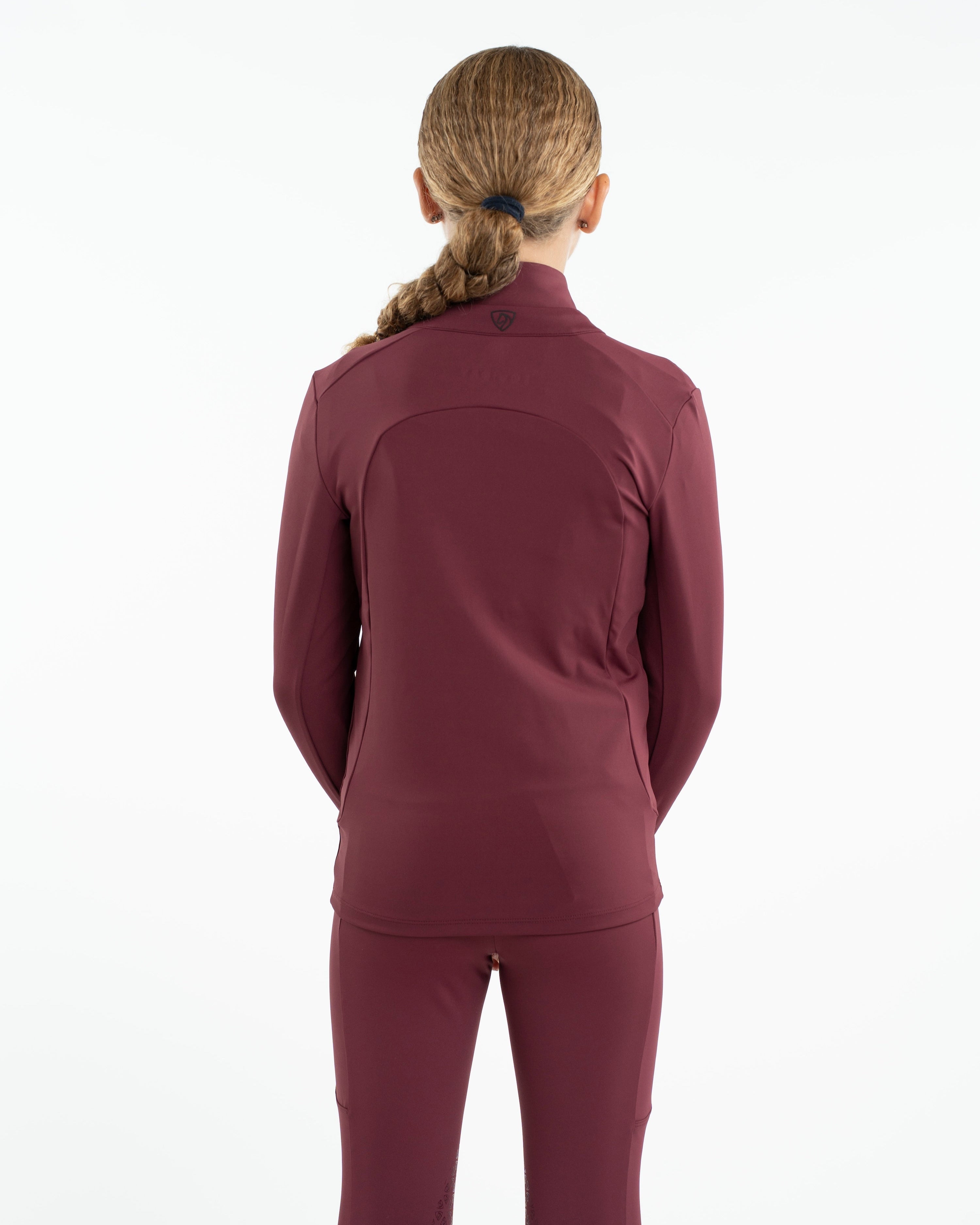 EQUIDRY Children's Water Repellent Zip Up Top (Plum/Black) - Back View. Equiflair riding apparel.