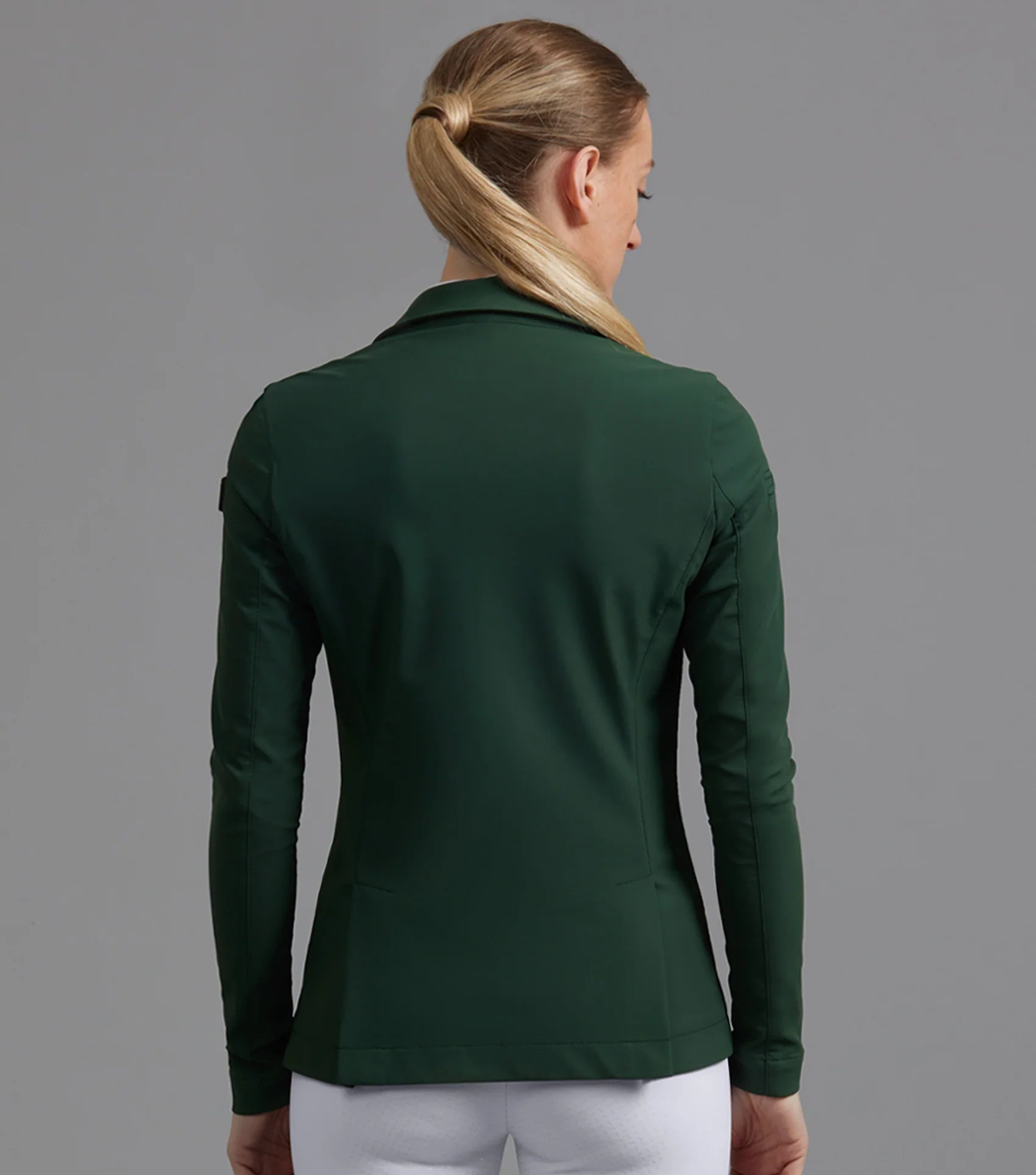 Premier Equine Evinco Ladies Competition Jacket - Alpine Green. Tailored equestrian show jacket for women.