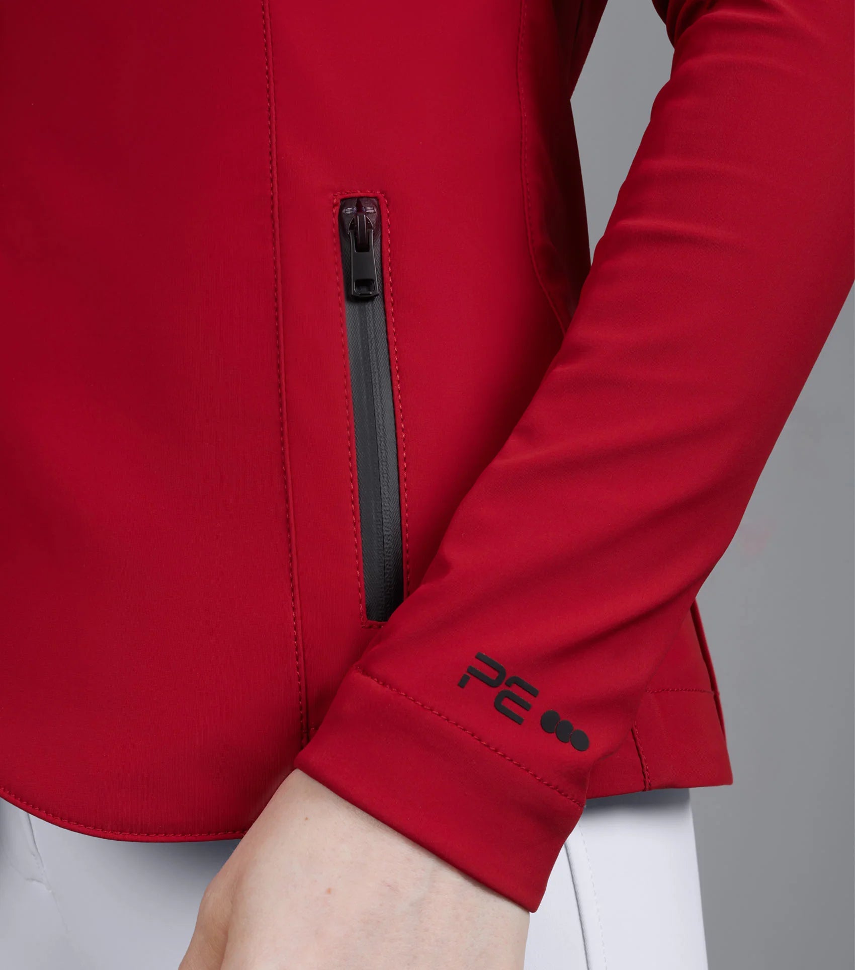 Red Premier Equine Ladies Competition Jacket: Equestrian Apparel with Zipper Detail & Sleeve Logo