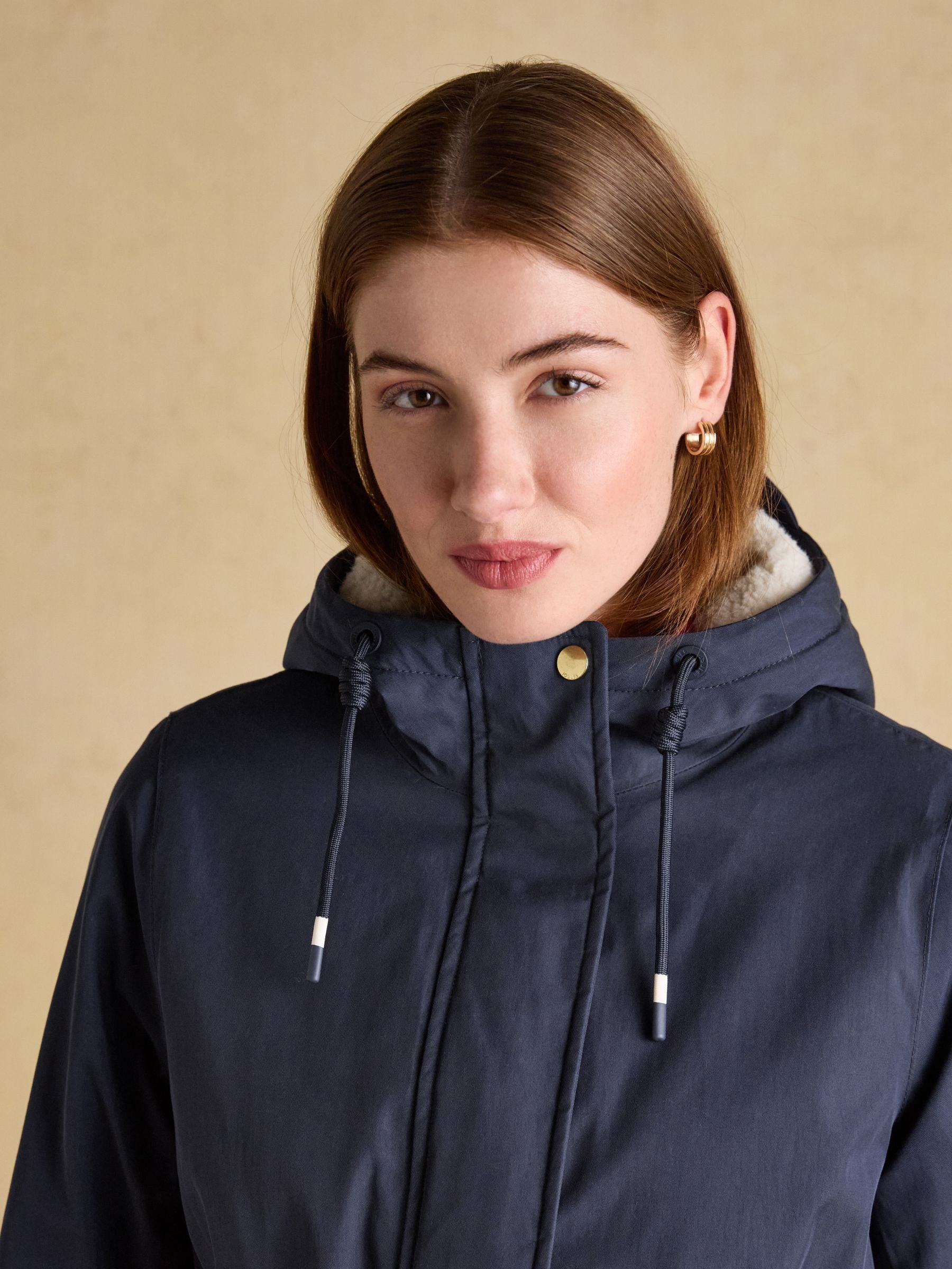 Joules women's navy waterproof fleece-lined raincoat with adjustable hood