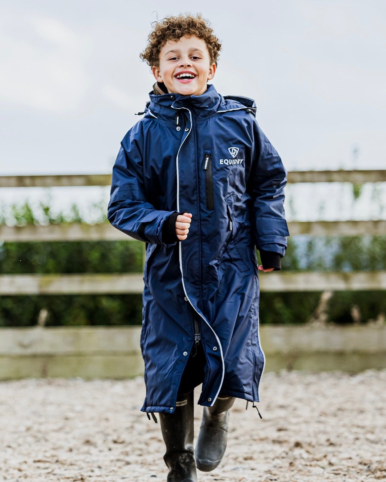 EQUIDRY waterproof horse riding raincoat thin fleece pro ride reflective in navy children's running in arena