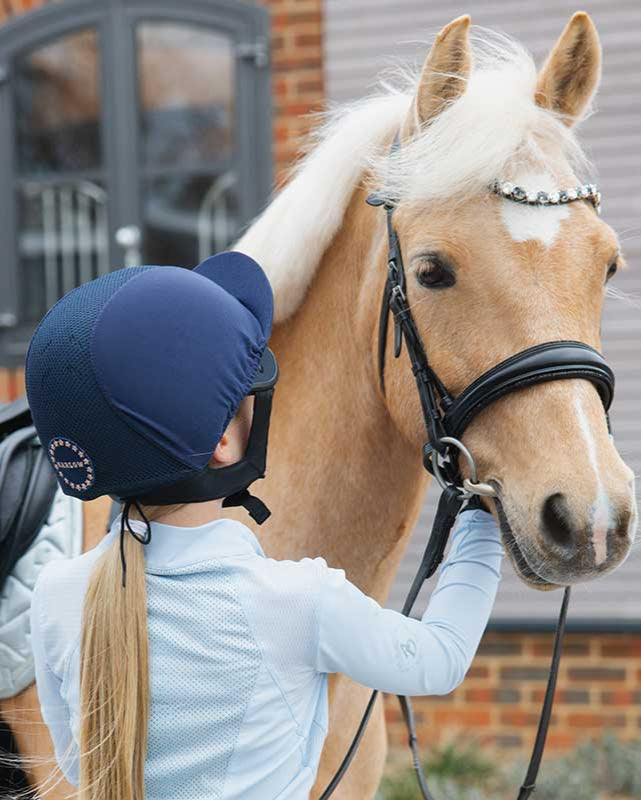 Girl with Horse & Charles Owen Harlow MS1 Pro Riding Helmet - Navy/Rose Gold Equestrian Gear
