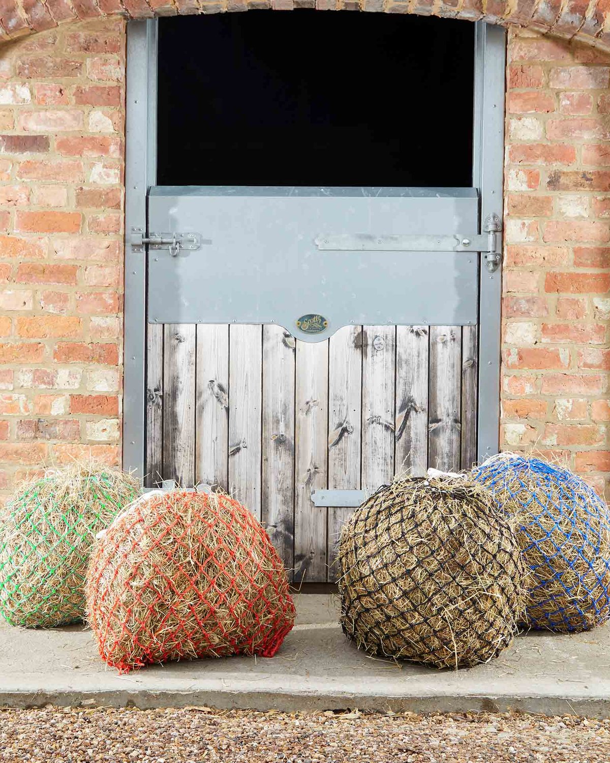 Hay Nets: Green, Red, Black, and Blue Horse Feeders | PREMIER EQUINE Haylage Nets for Horses