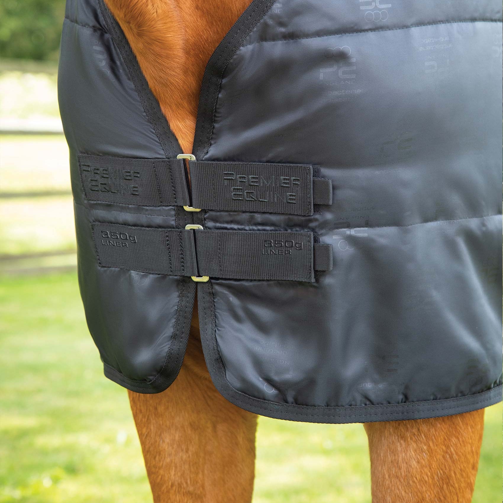 Premier Equine 350g Black Horse Rug Liner: Anti-Static, Antibacterial, Quilted Design. Close-up shot. #HorseRug #EquineLiner