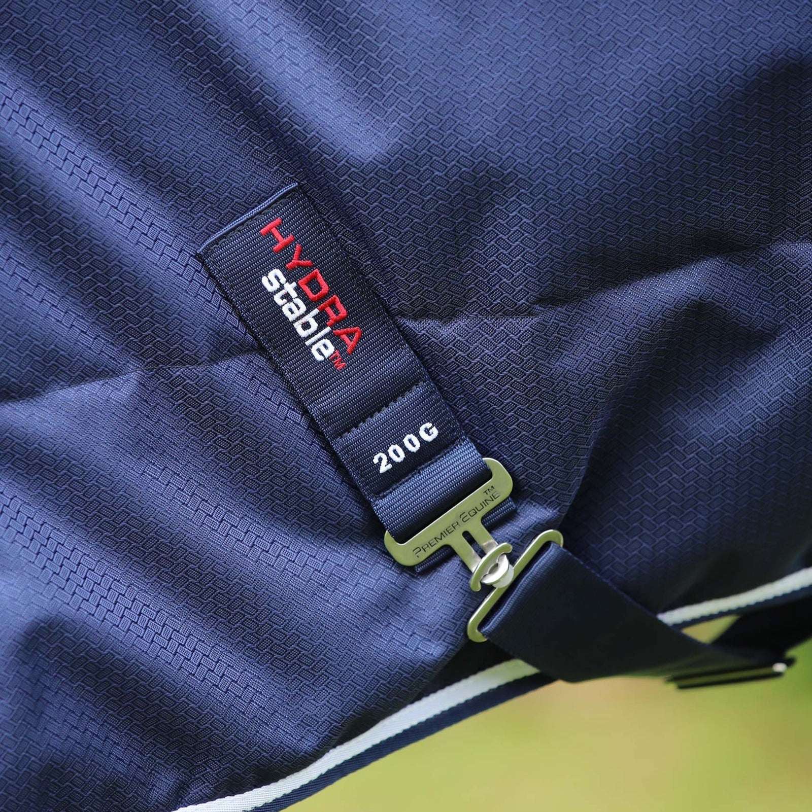 Premier Equine Hydra Stable Rug 200g: Close-up of Horse Rug Label & Buckle