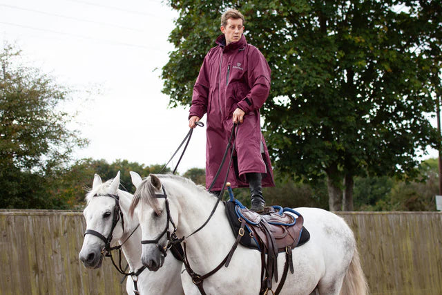 Equidry Evolution Plum Coat: Man standing on horseback, horse riding outerwear, Equiflair