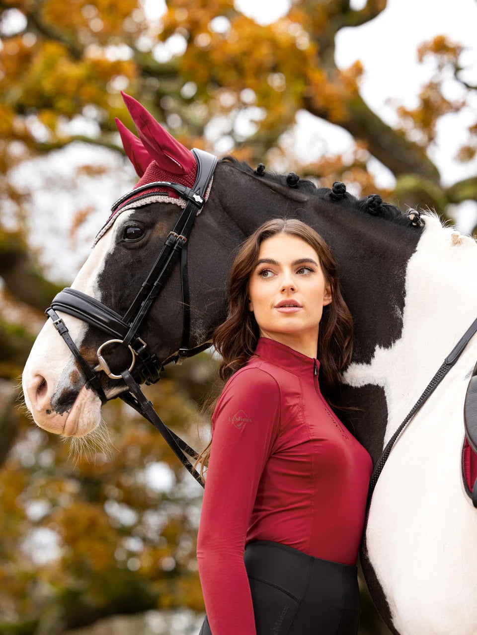 LeMieux Base Layer Ember Equestrian Riding Top. Woman with Horse. Comfortable Horse Riding Apparel.