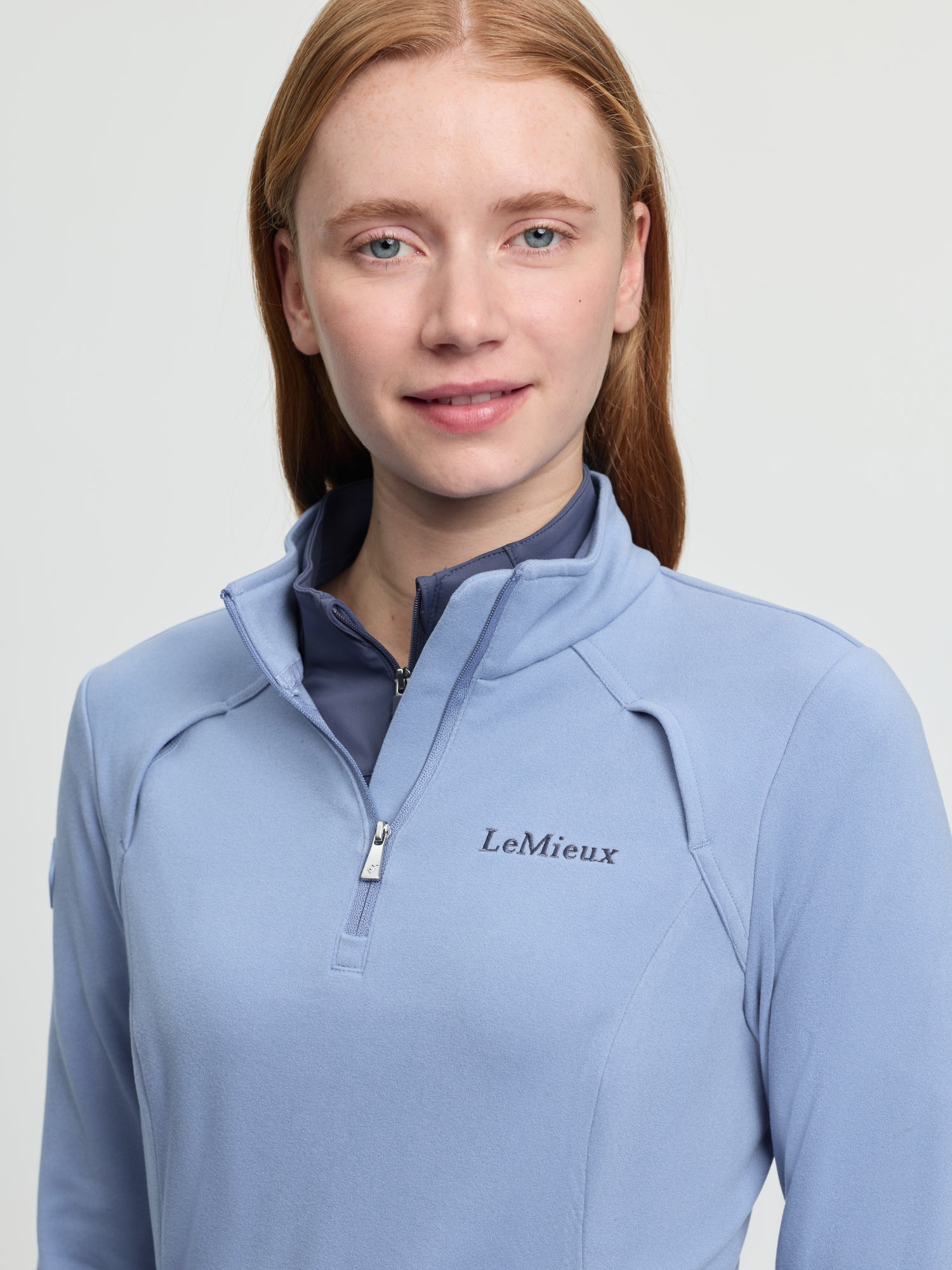 LeMieux Frances Quarter Zip Fleece - Powder Blue. Equestrian riding top by Equiflair.