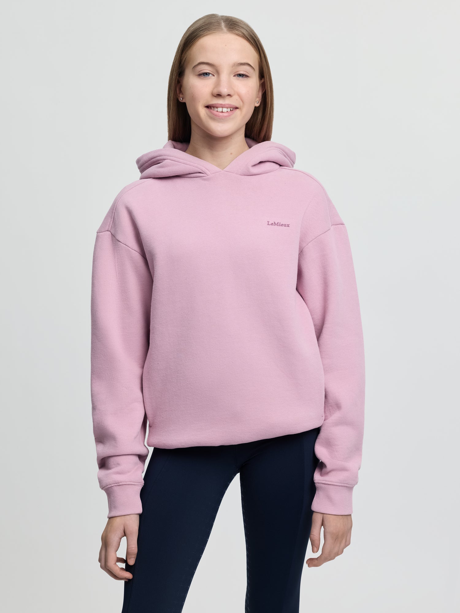 LeMieux Young Rider Sia Hoodie in Fondant - Oversized pink equestrian hoodie for girls with bubble print logo.