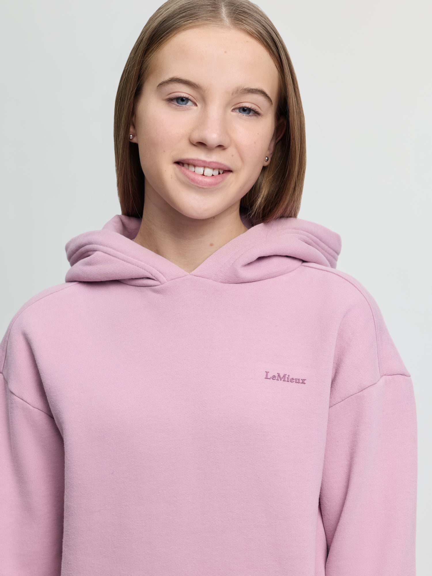 Young Rider in LeMieux Pink Hoodie - Youth Equestrian Apparel
