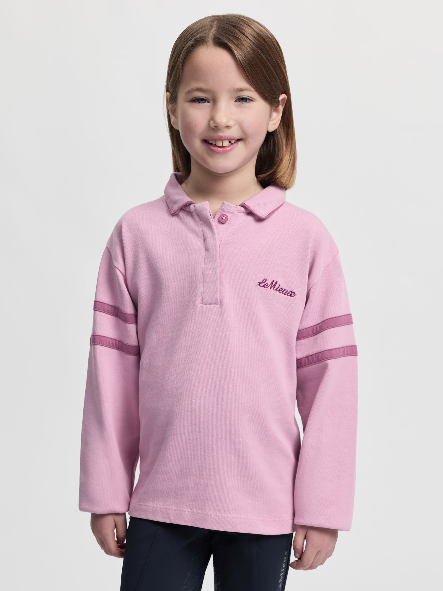 LEMIEUX MINI ROBBIE RUGBY SHIRT MALLOW - Girl in pink long sleeve rugby shirt