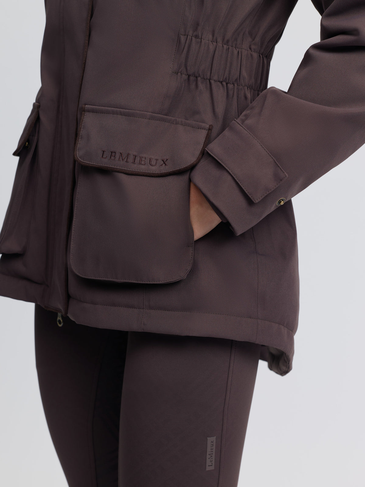 LeMieux Heritage Beatrice Cocoa brown women's waterproof country coat with patch pockets.