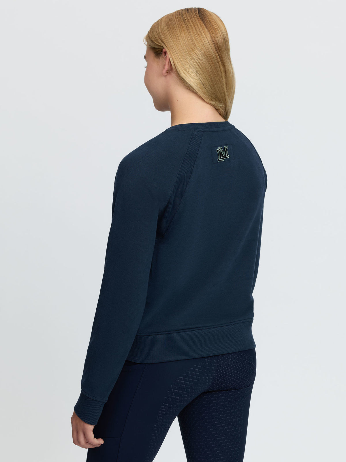 LeMieux Young Rider Shay Varsity Crew Navy sweatshirt with embroidered 'M' logo.