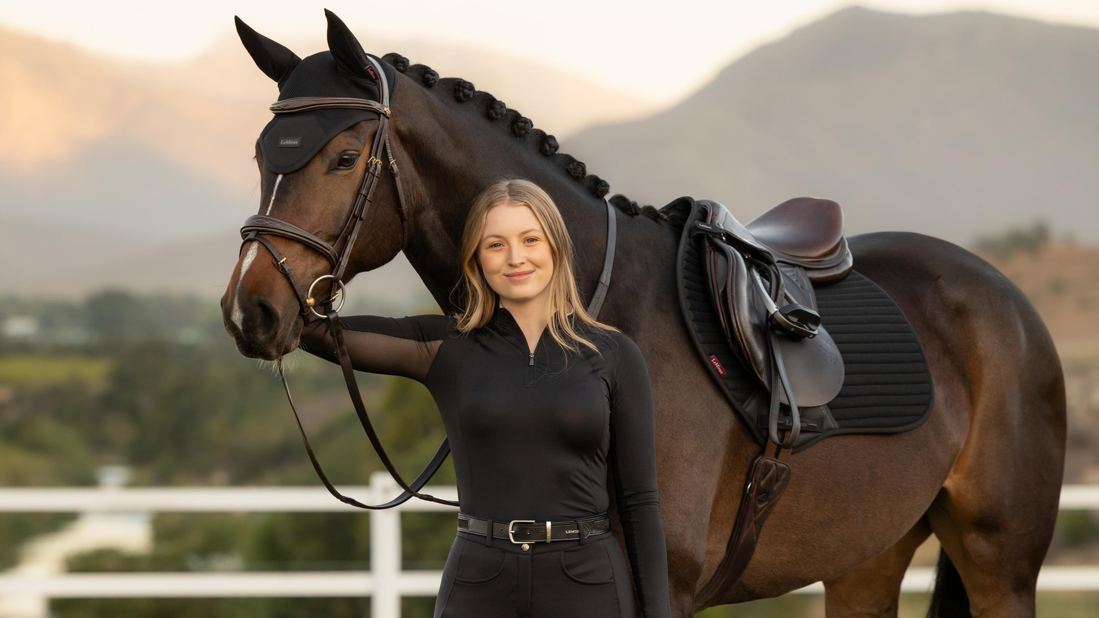 LeMieux Air-Tek black close contact saddle pad on horse breathable cooling pad