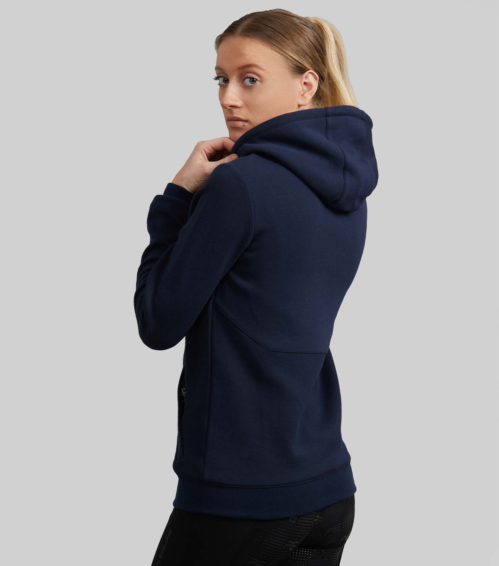 Premier Equine Legato French Navy Hooded Full-Zip Sweatshirt. Stylish, breathable equestrian jacket for women.