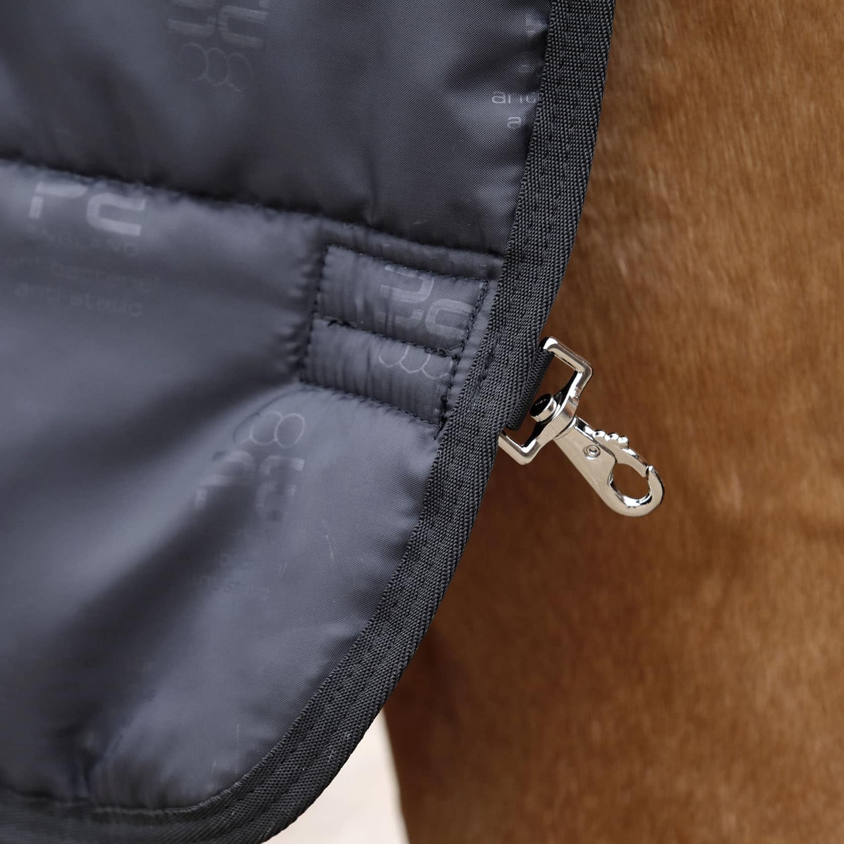 Premier Equine 100g Lucanta Rug Liner Black - Close-up of Horse Blanket Attachment Detail