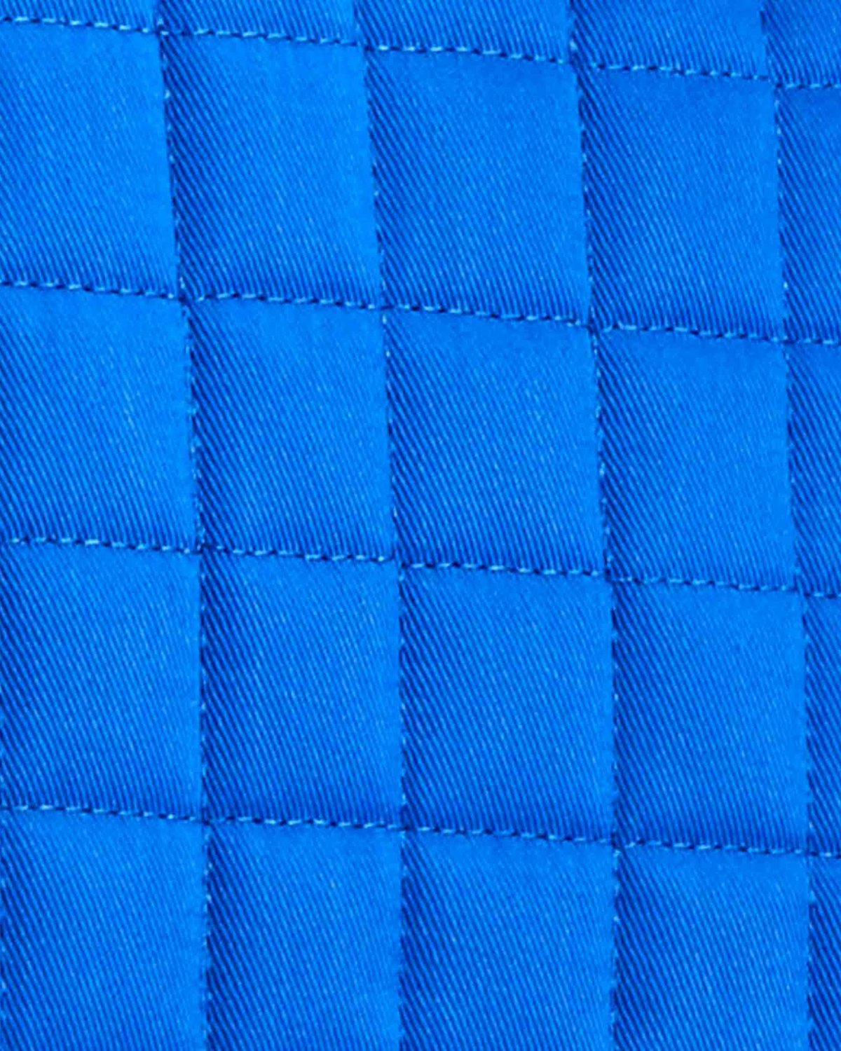 Blue Quilted Saddle Pad for Horse Riding: Close-up of a Premium Equestrian Numnah
