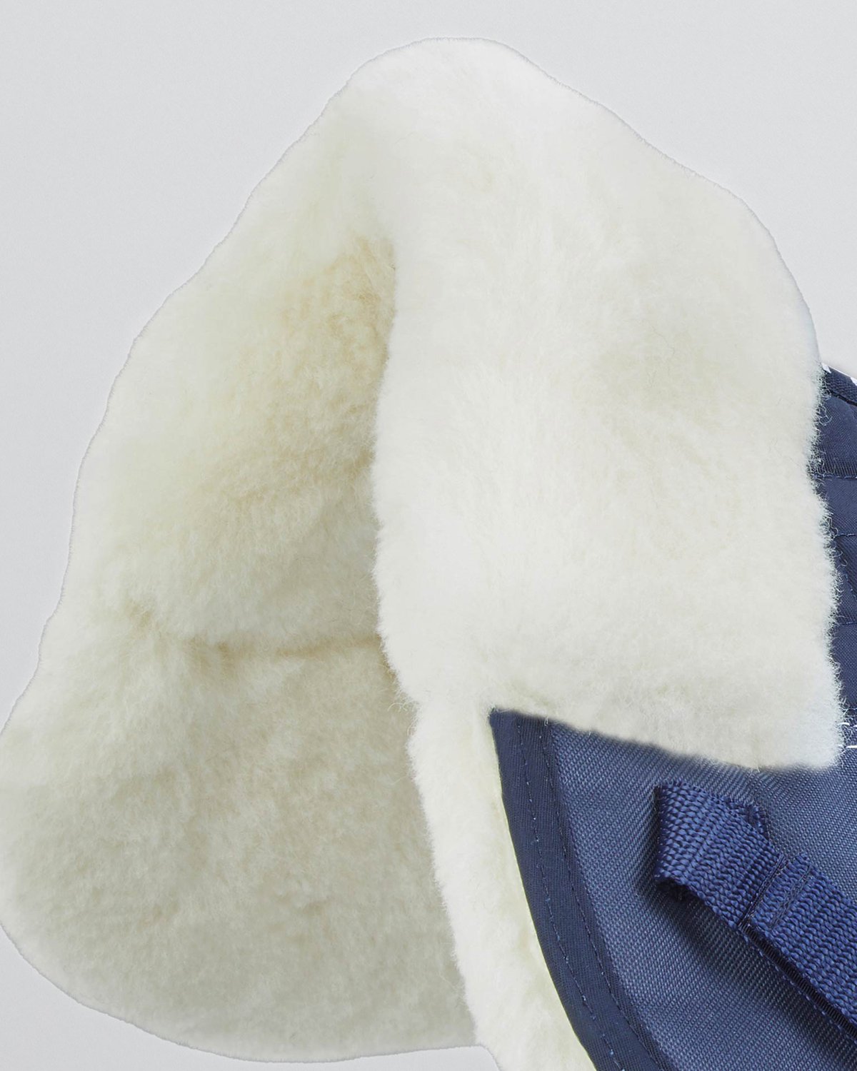 Premier Equine Merino Wool Saddle Pad - Half Pad Navy/Natural Wool close-up, high wither design, wool wicks away moisture