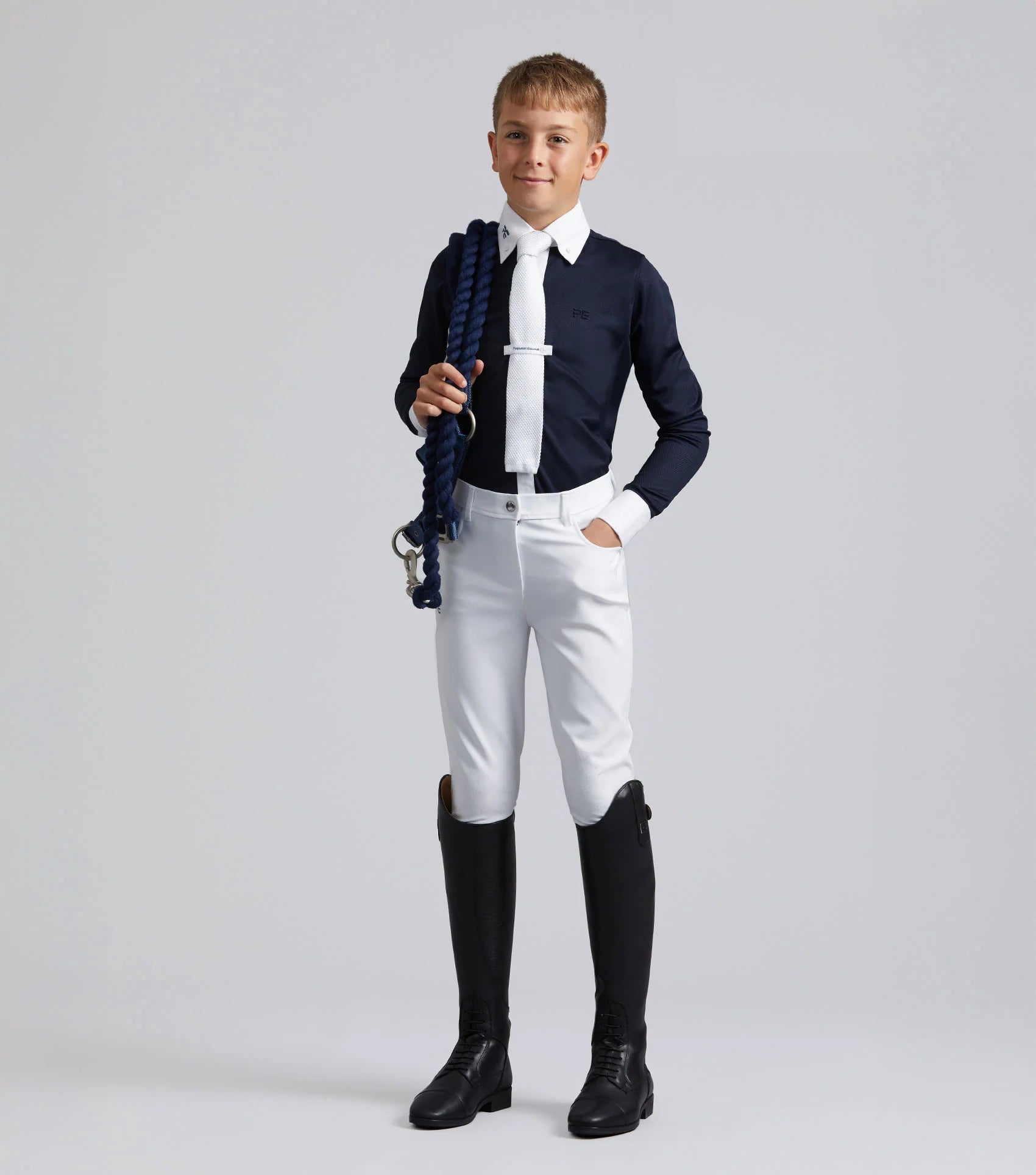 Premier Equine Mini Giulio Boy's Navy Show Shirt: Stylish equestrian attire for young riders.