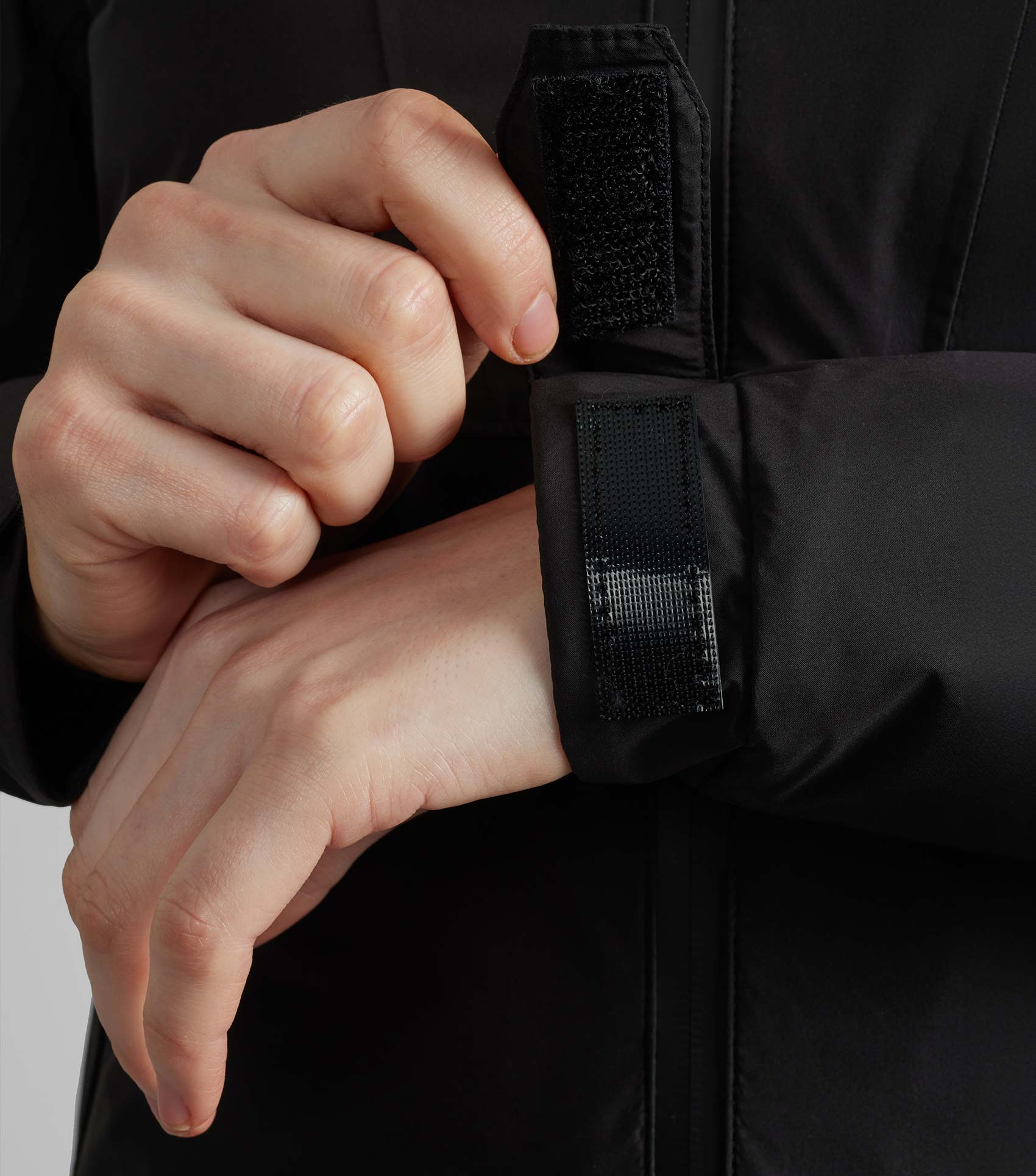 Adjusting Velcro Cuffs on Premier Equine Motet Ladies Waterproof Jacket - Black | Waterproof, Breathable, Adjustable