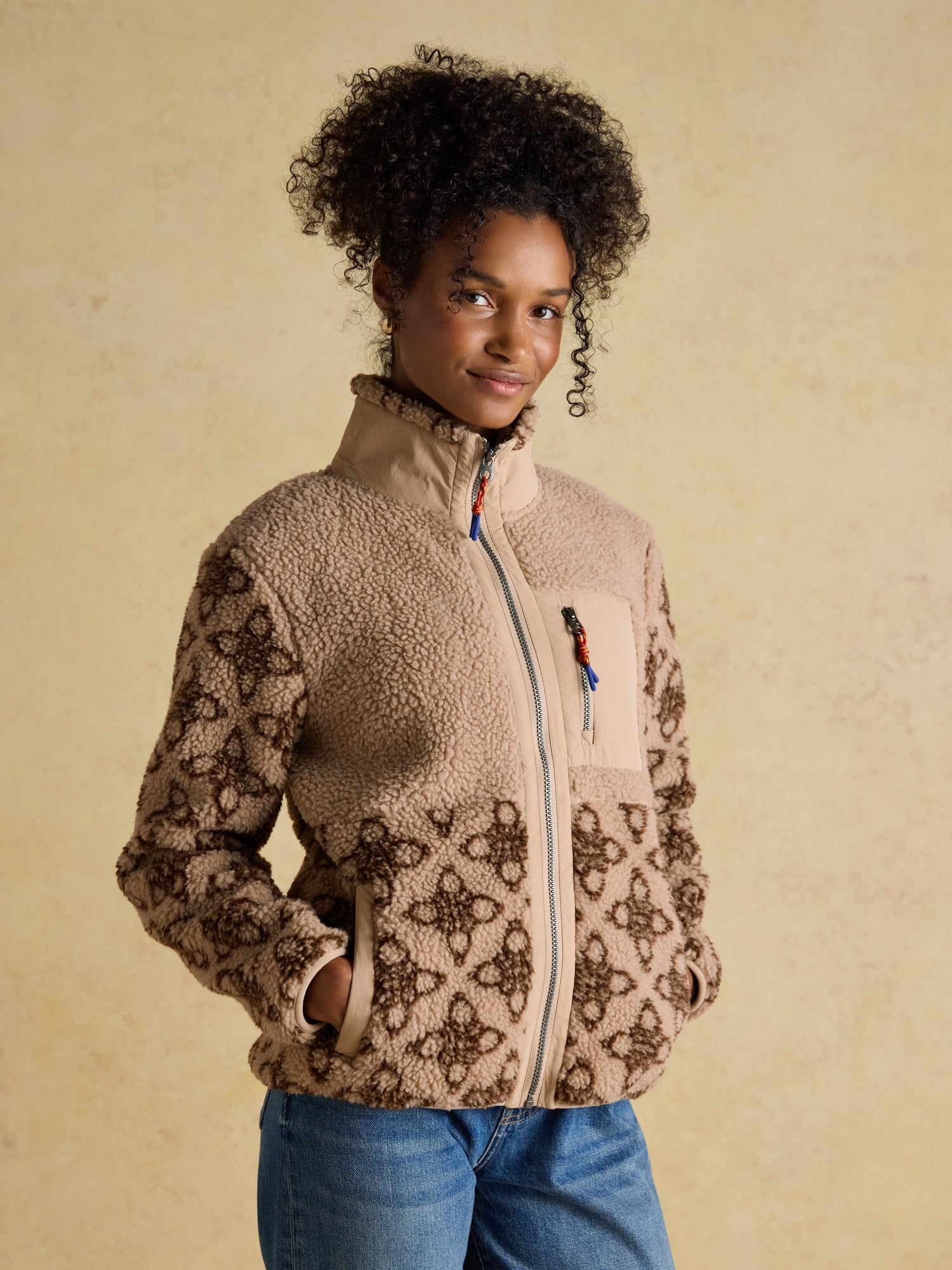 Joules Lottie Neutral Icon Print Borg Fleece Jacket with Zip Fastening, High Collar, Chest Pocket, and Side Pockets