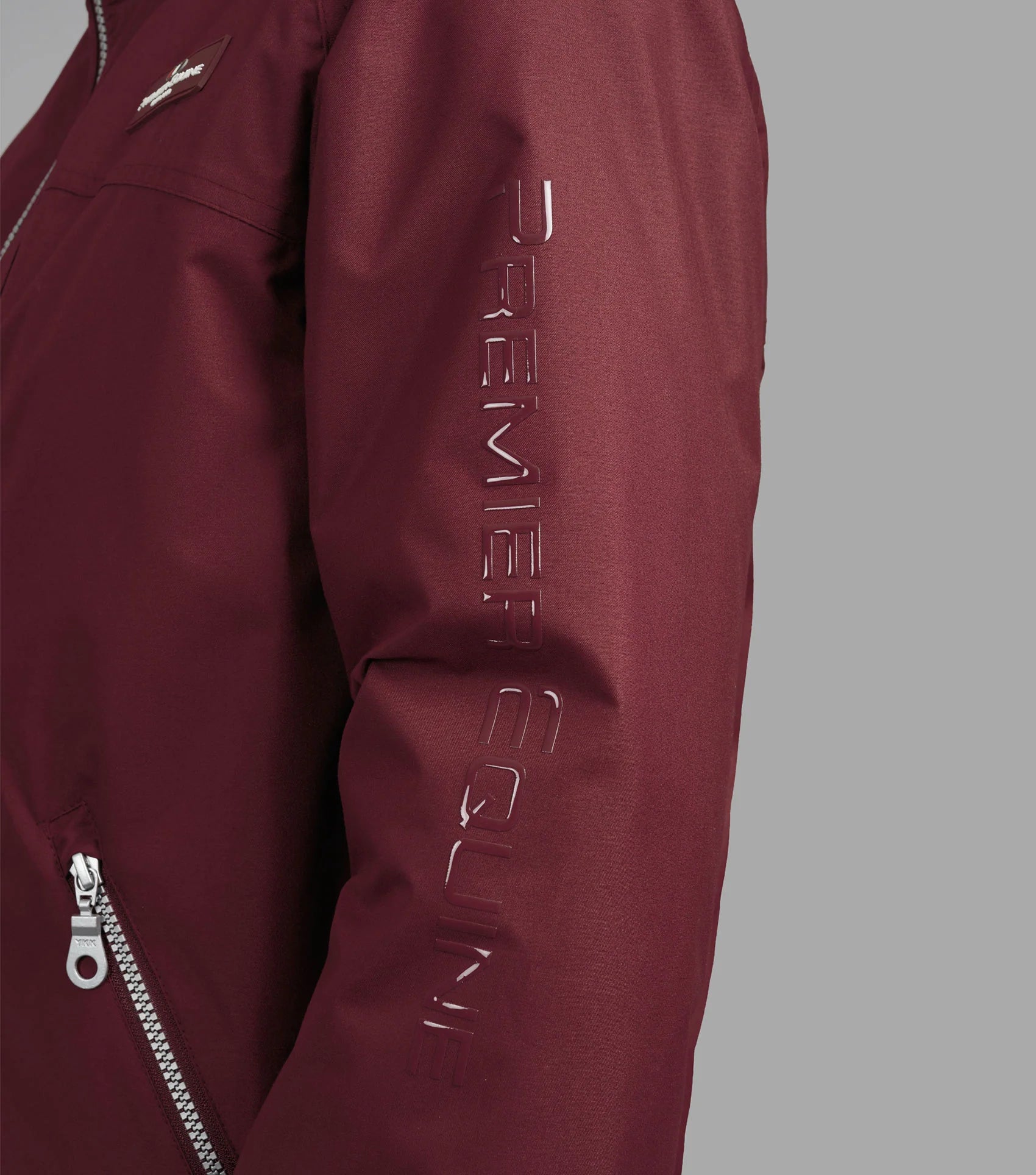 PREMIER EQUINE PRO RIDER Unisex Waterproof Riding Jacket - Wine. Waterproof, breathable riding coat for equestrian athletes.