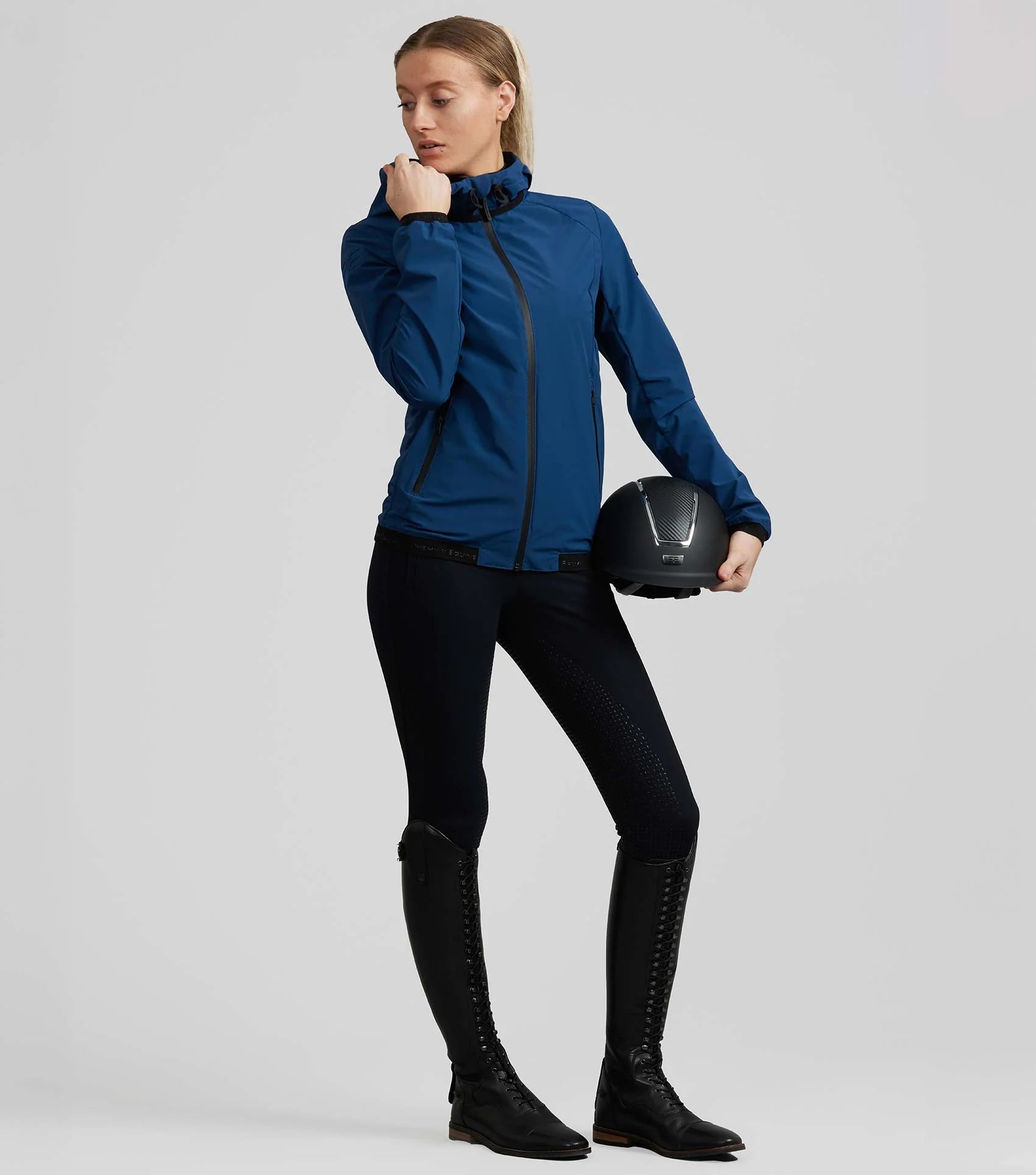 Premier Equine Spinto Waterproof Riding Jacket - Navy. Equestrian apparel for women, rain gear, horse riding attire.