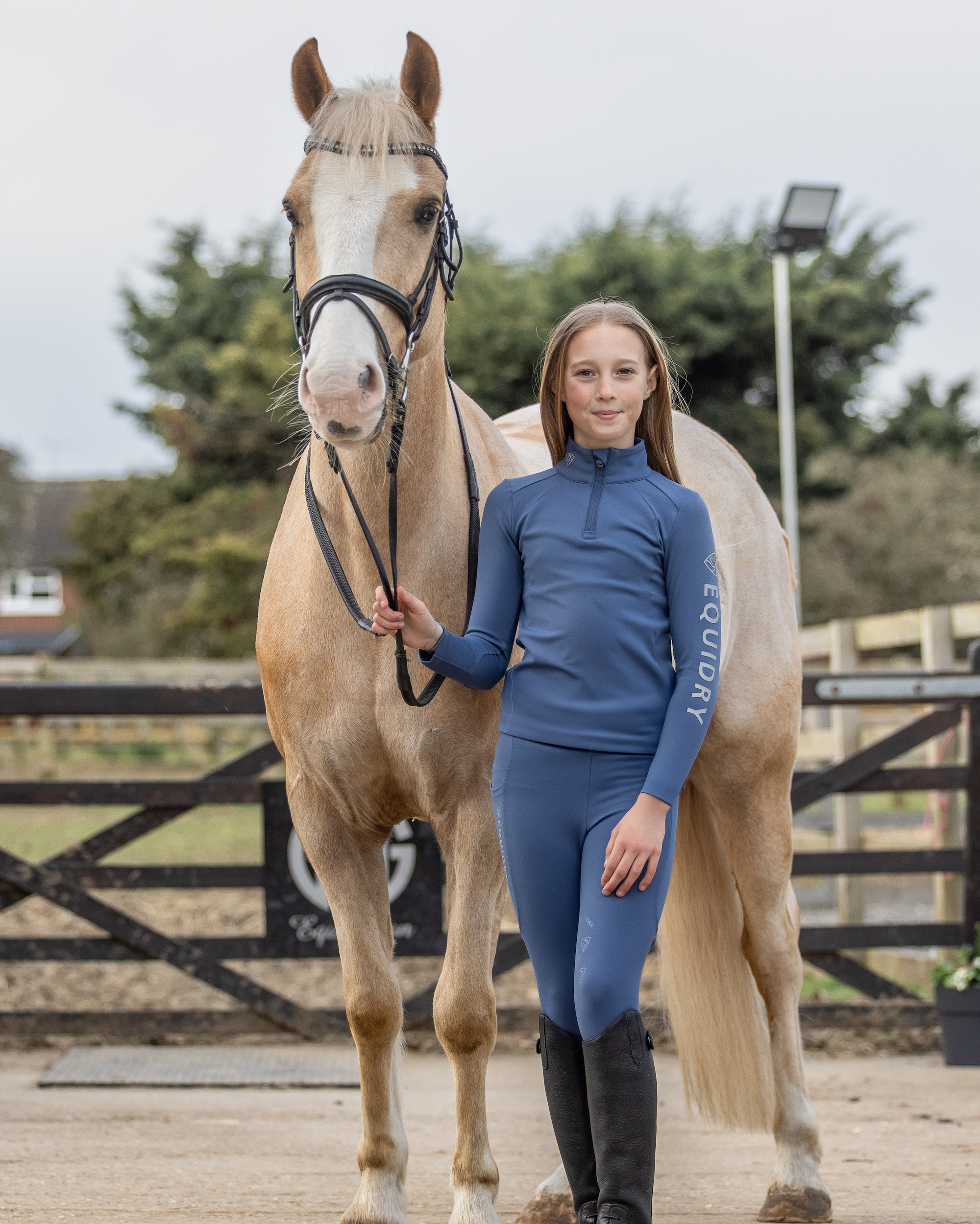 Girl with Horse in Equidry Riding Base Layer - Equestrian Apparel