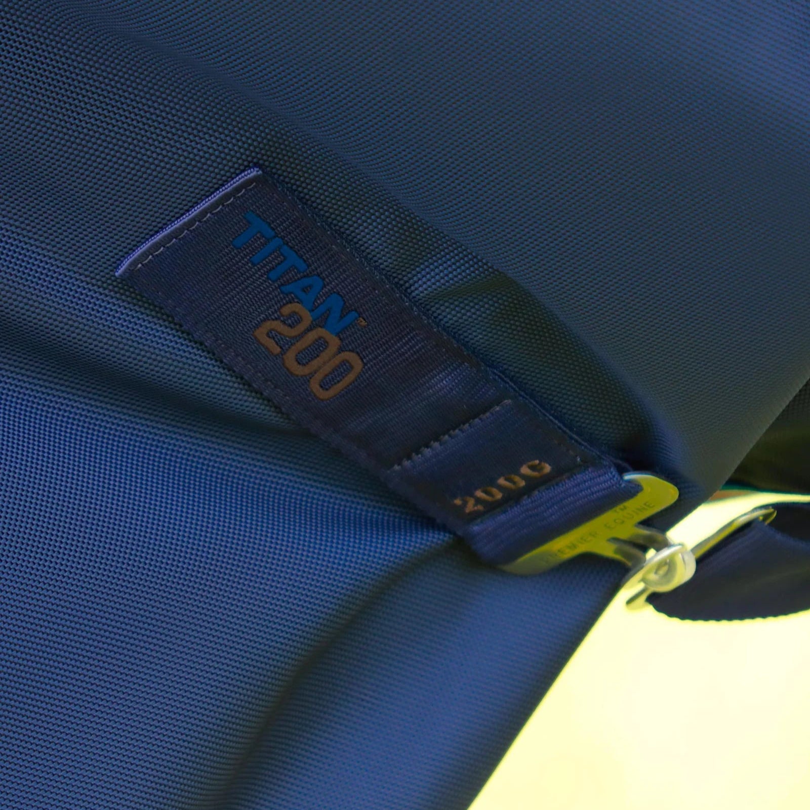 PREMIER EQUINE Titan 200G Turnout Rug Navy Detail: Snug-Fit Neck Cover, Rug Features, Weatherproof Protection.