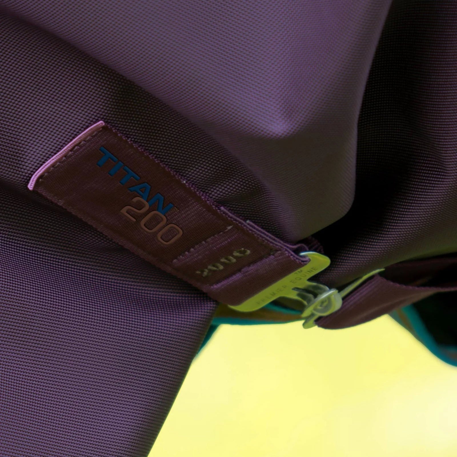 PREMIER EQUINE Titan 200G Purple Turnout Rug with Snug-Fit Neck Cover Label Detail