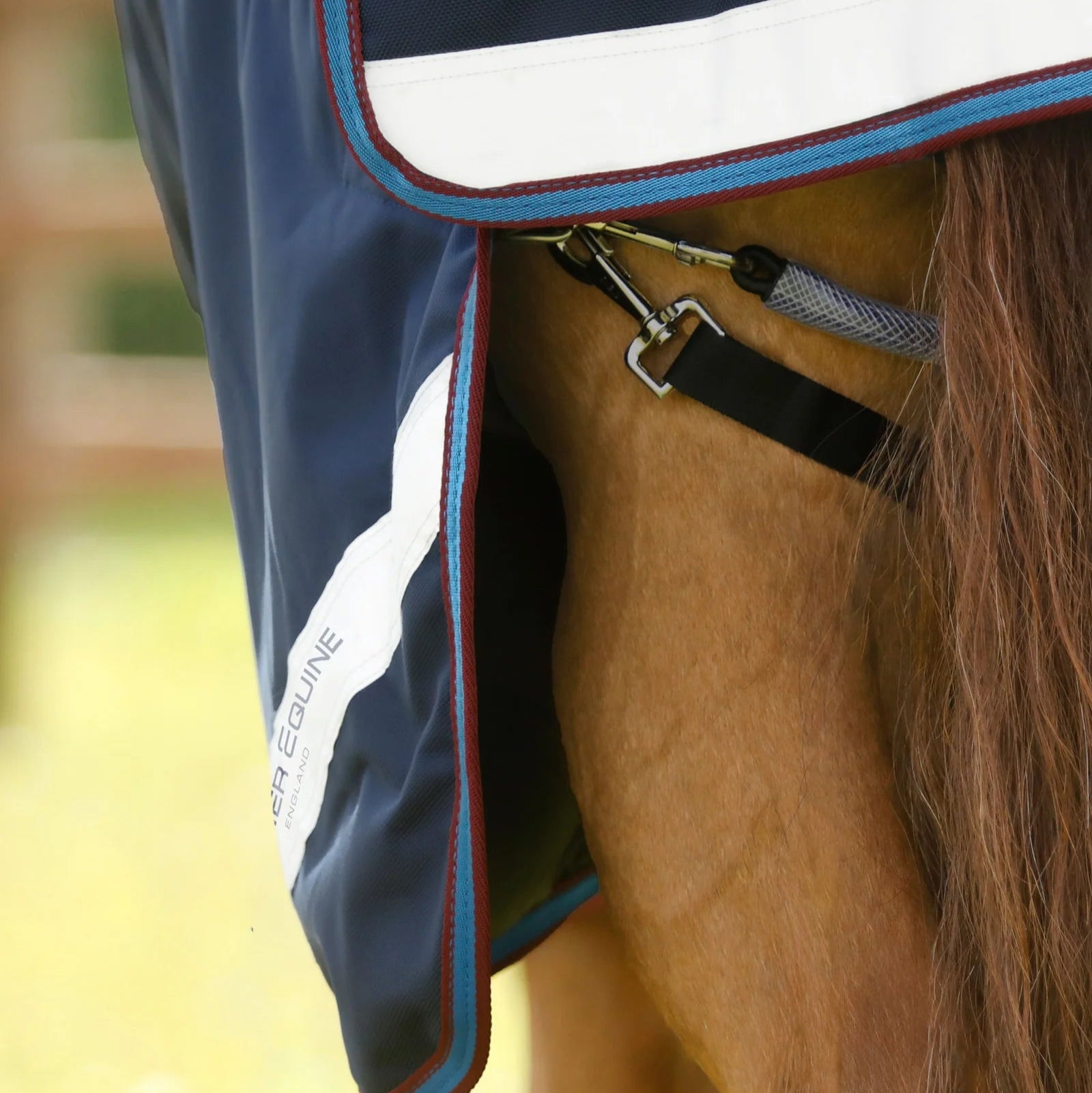 PREMIER EQUINE Titan Storm 200g Navy Horse Turnout Rug with Snug-Fit Neck. Close-up rear view.