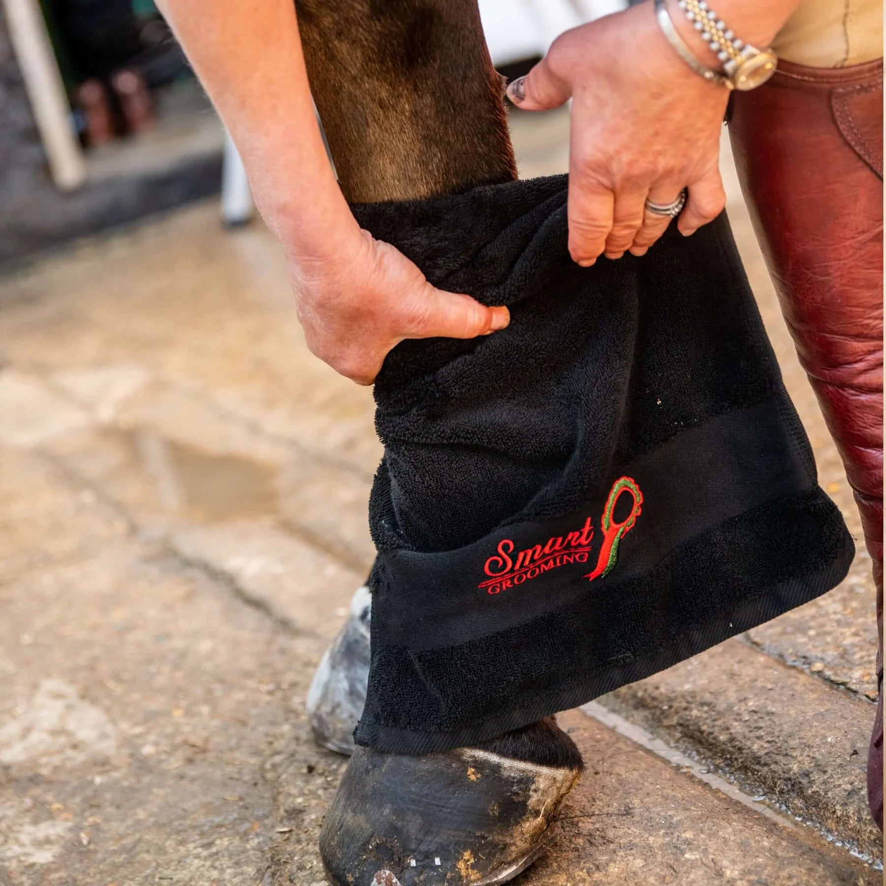 Smart Grooming Handy Towel on horse leg. Equiflair grooming product for horses.